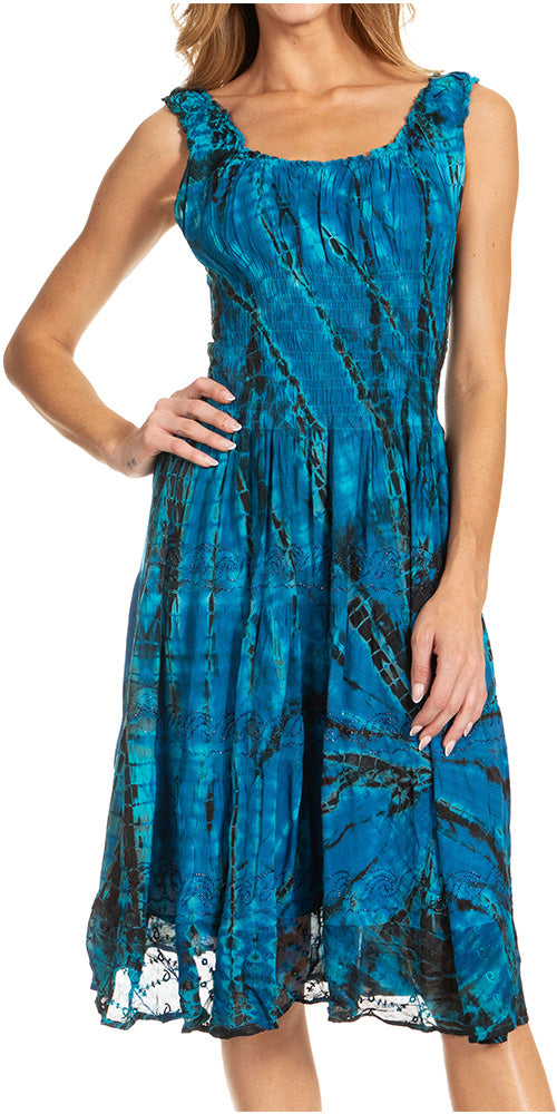 Woman wearing a blue patterned dress on a white background