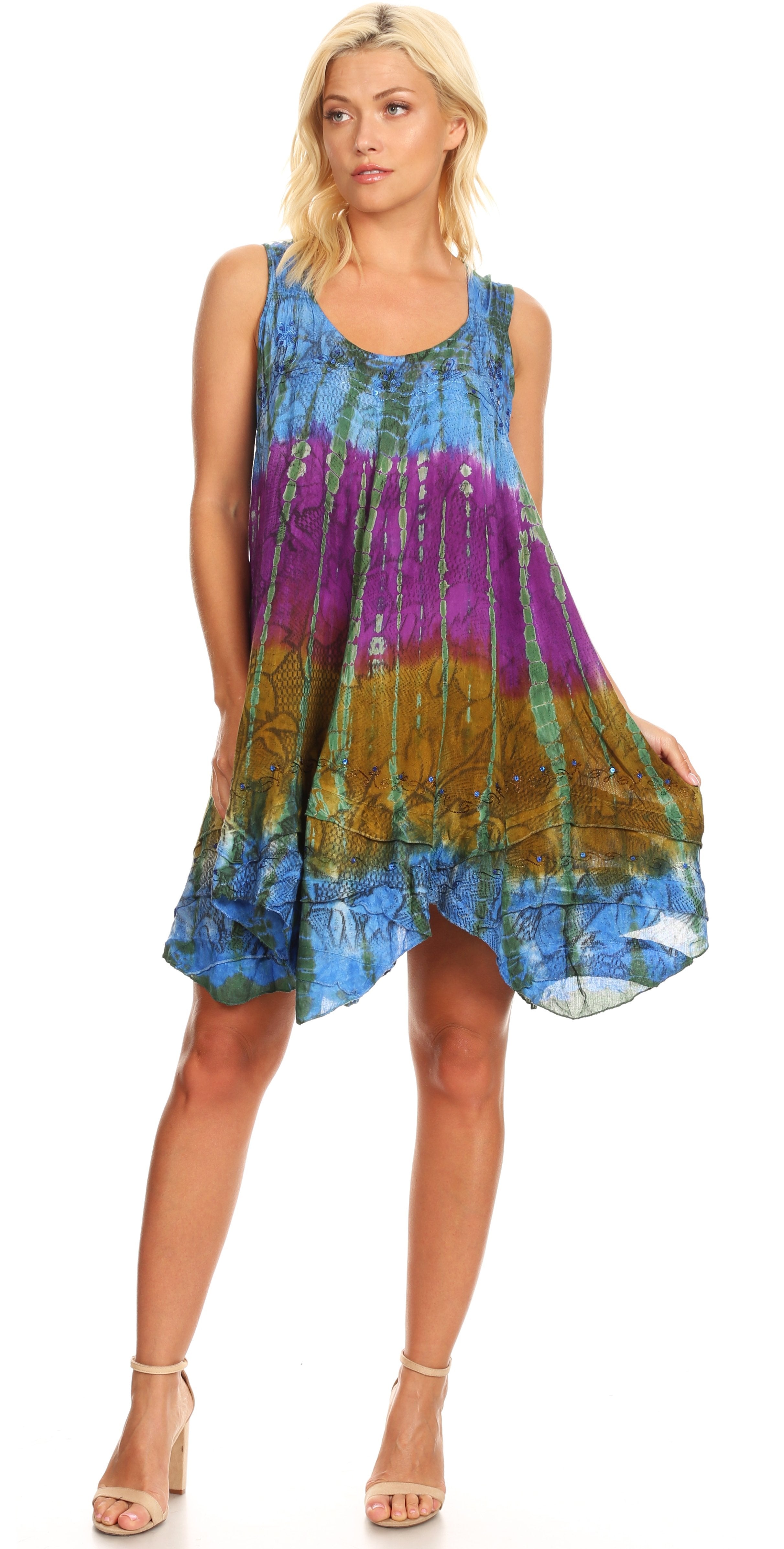 Woman wearing a colorful tie-dye dress on a white background