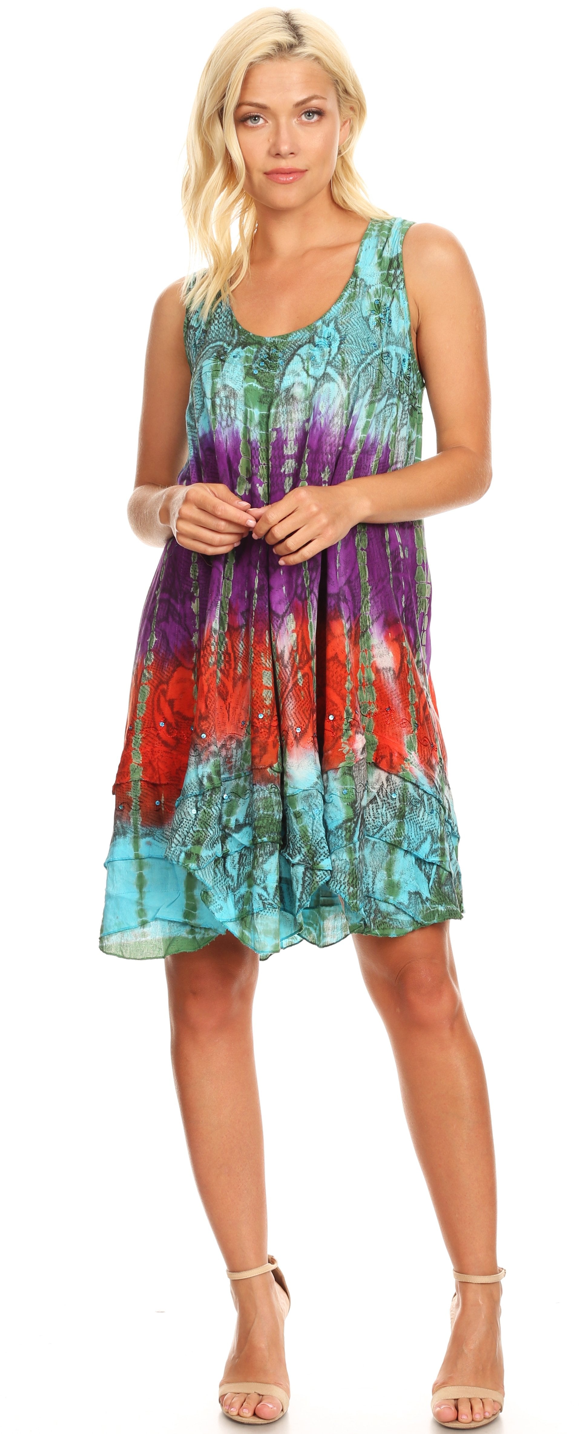 Woman wearing a colorful tie-dye dress on a white background
