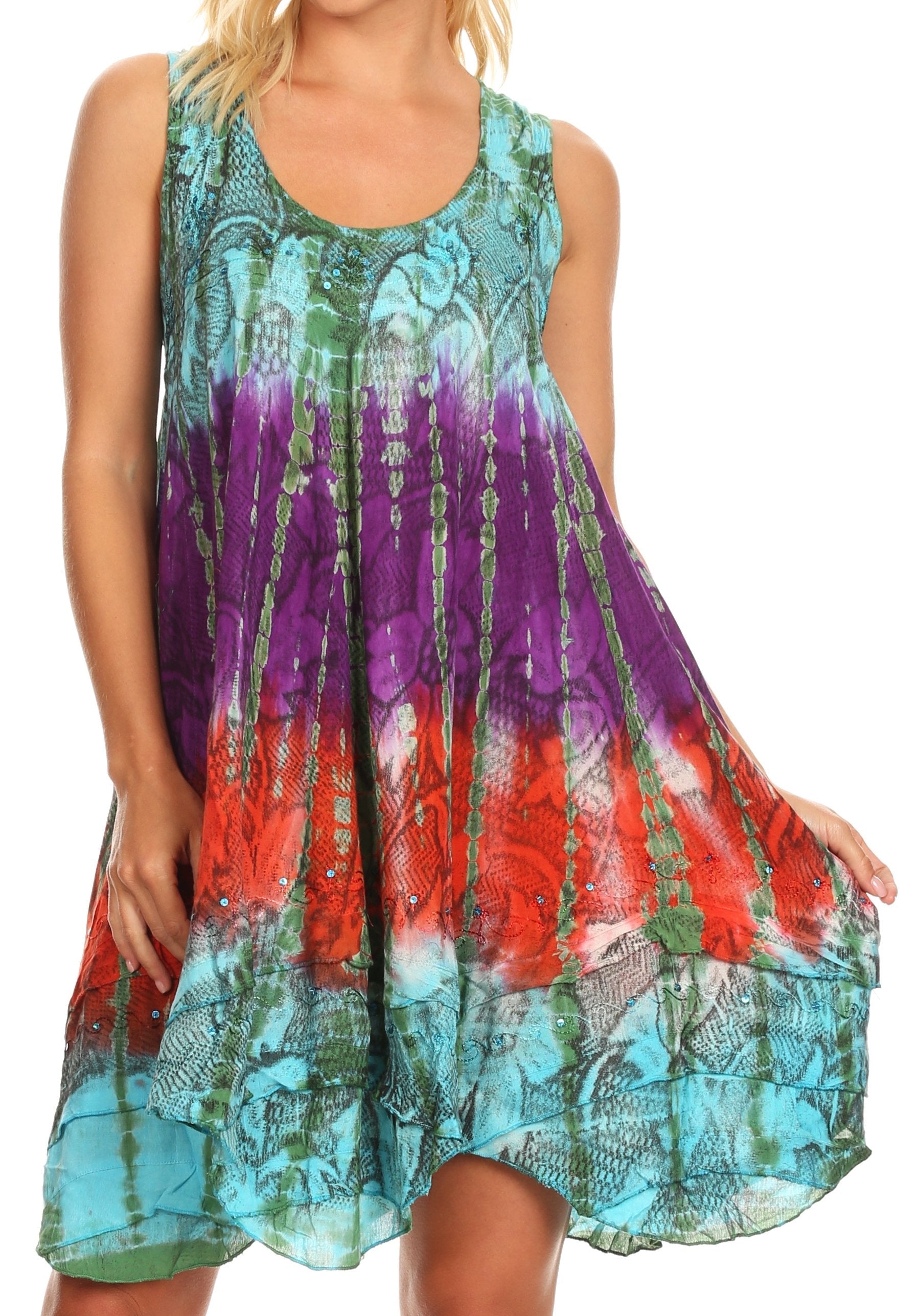 Multicolored tie-dye dress worn by a model on a white background
