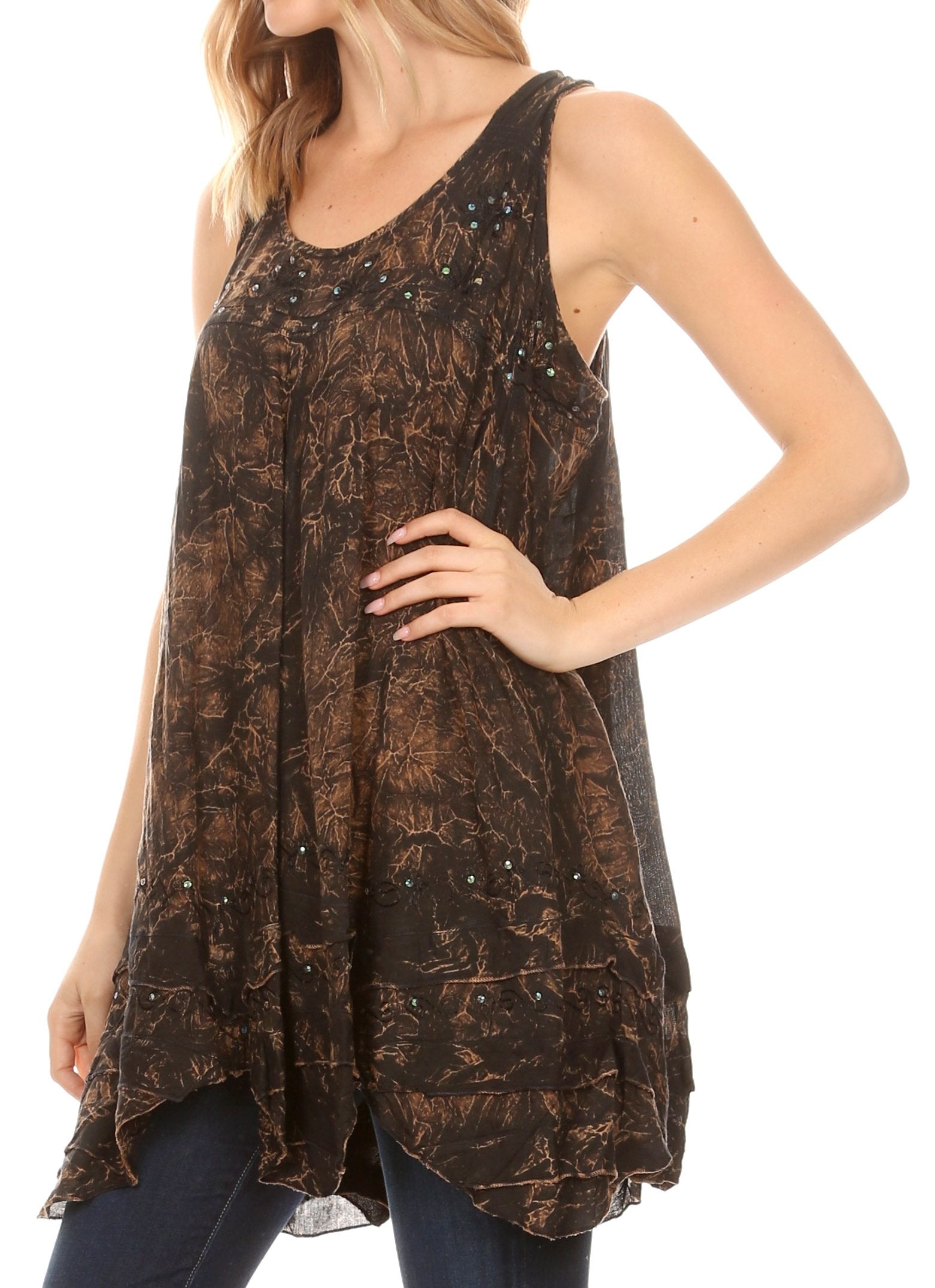 Woman wearing a brown patterned sleeveless top on a white background