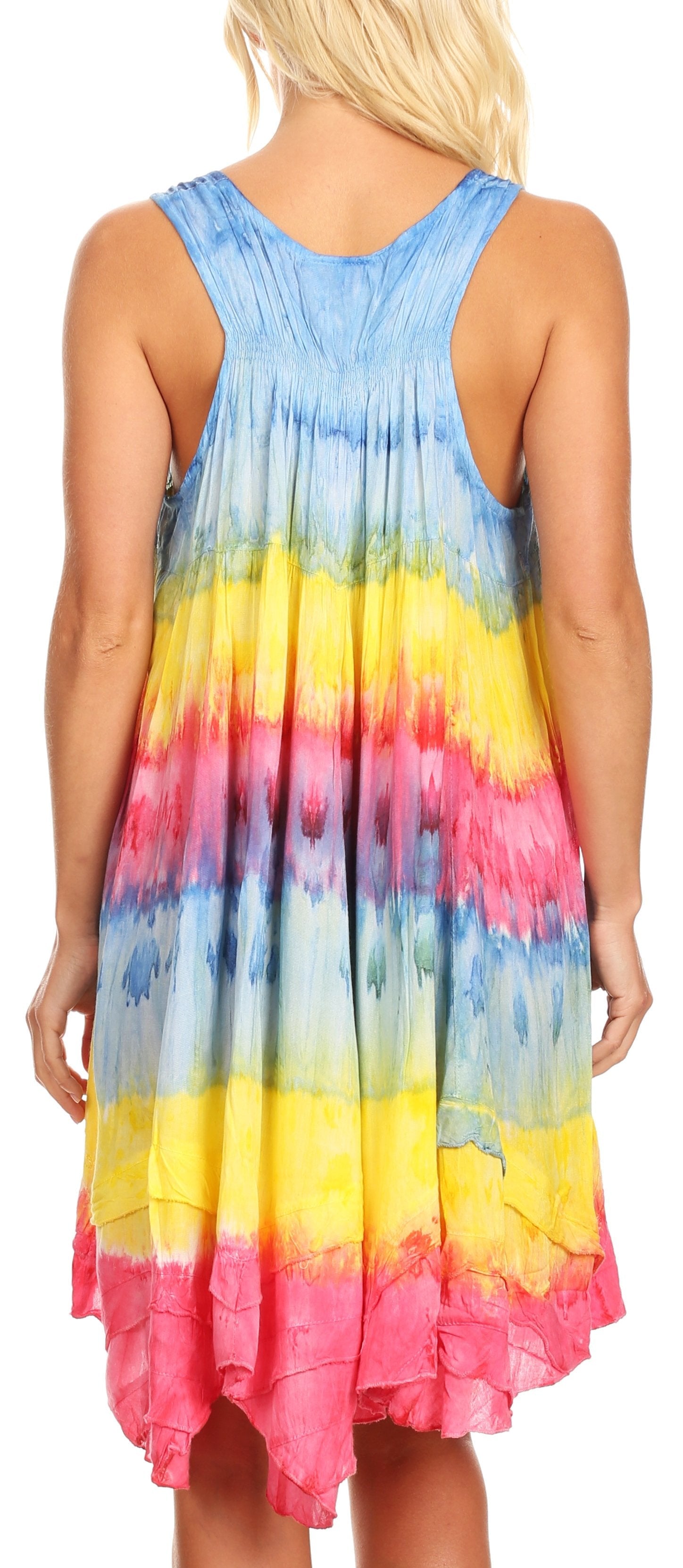 Woman wearing a colorful tie-dye dress with a white background