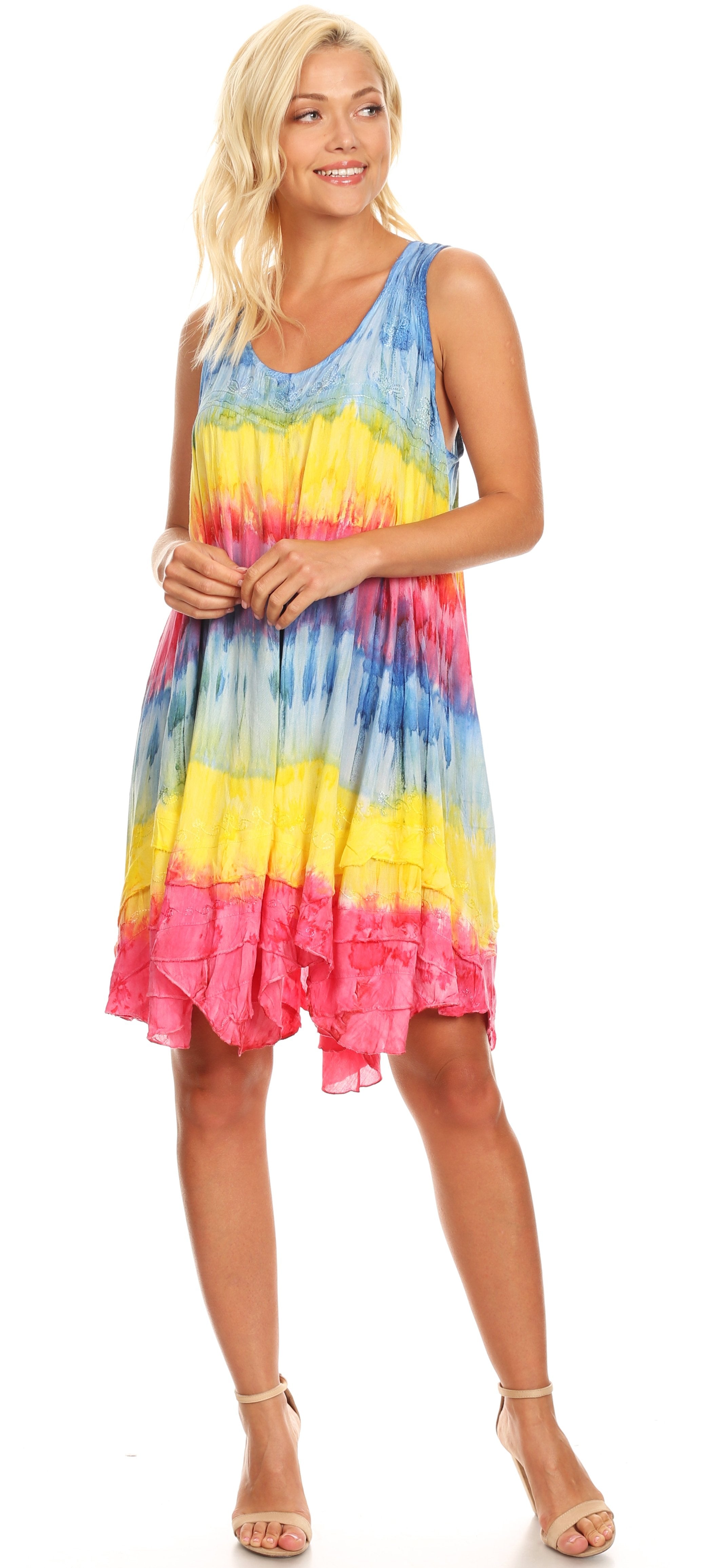 Woman wearing a colorful tie-dye dress on a white background