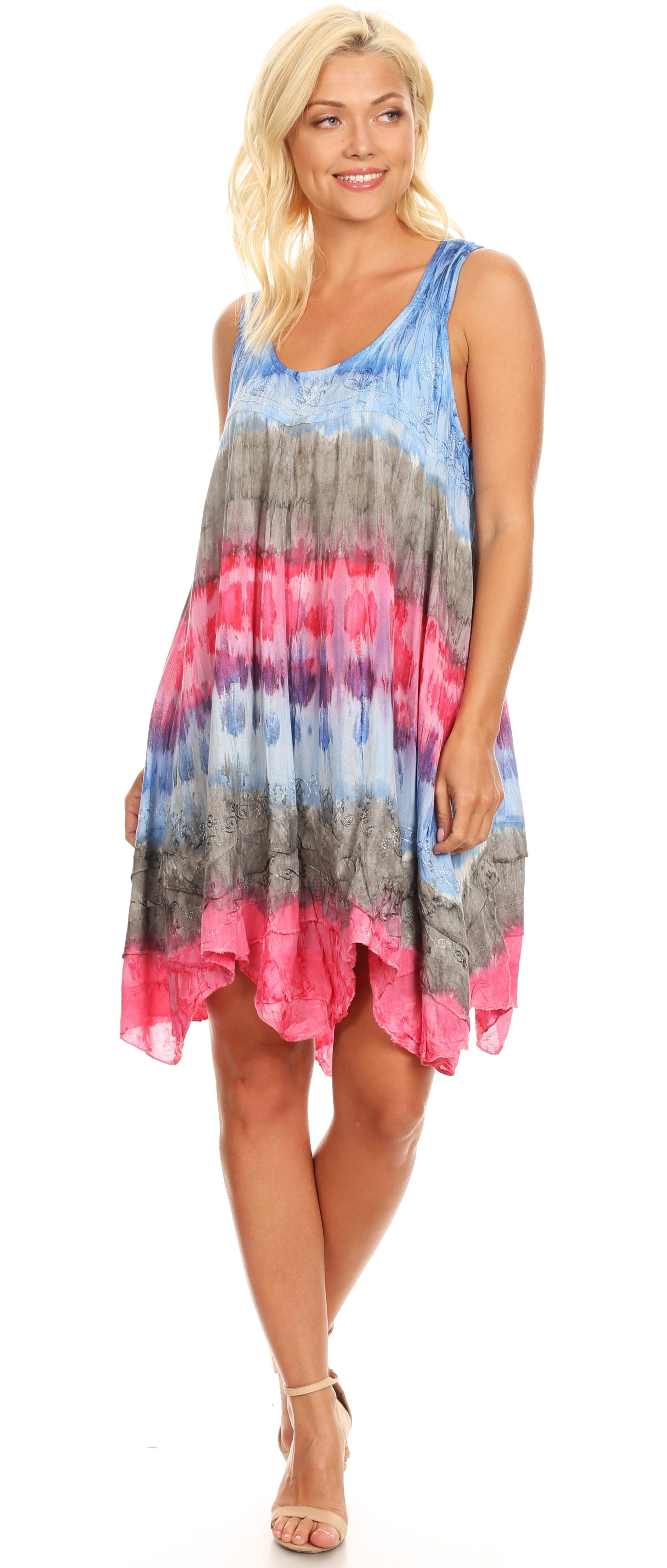 Woman wearing a colorful tie-dye dress on a white background