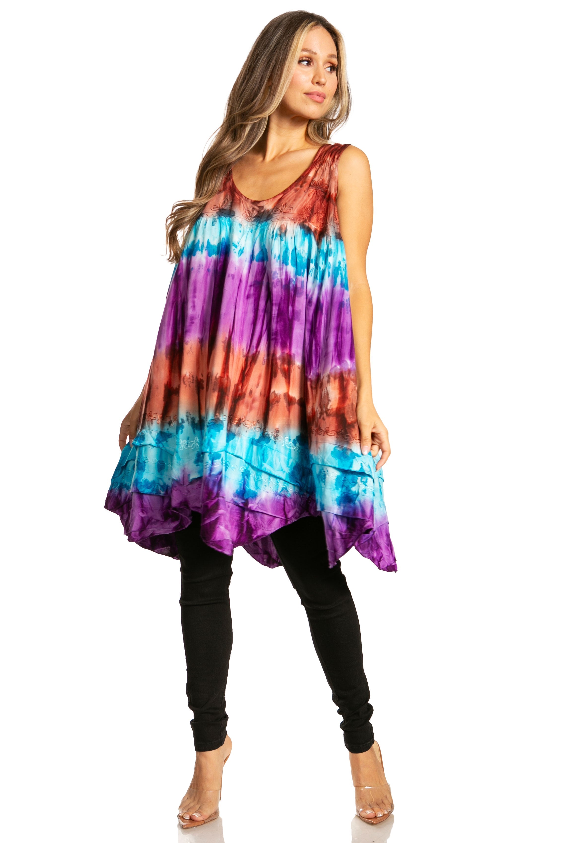 Woman wearing a colorful tie-dye dress on a white background