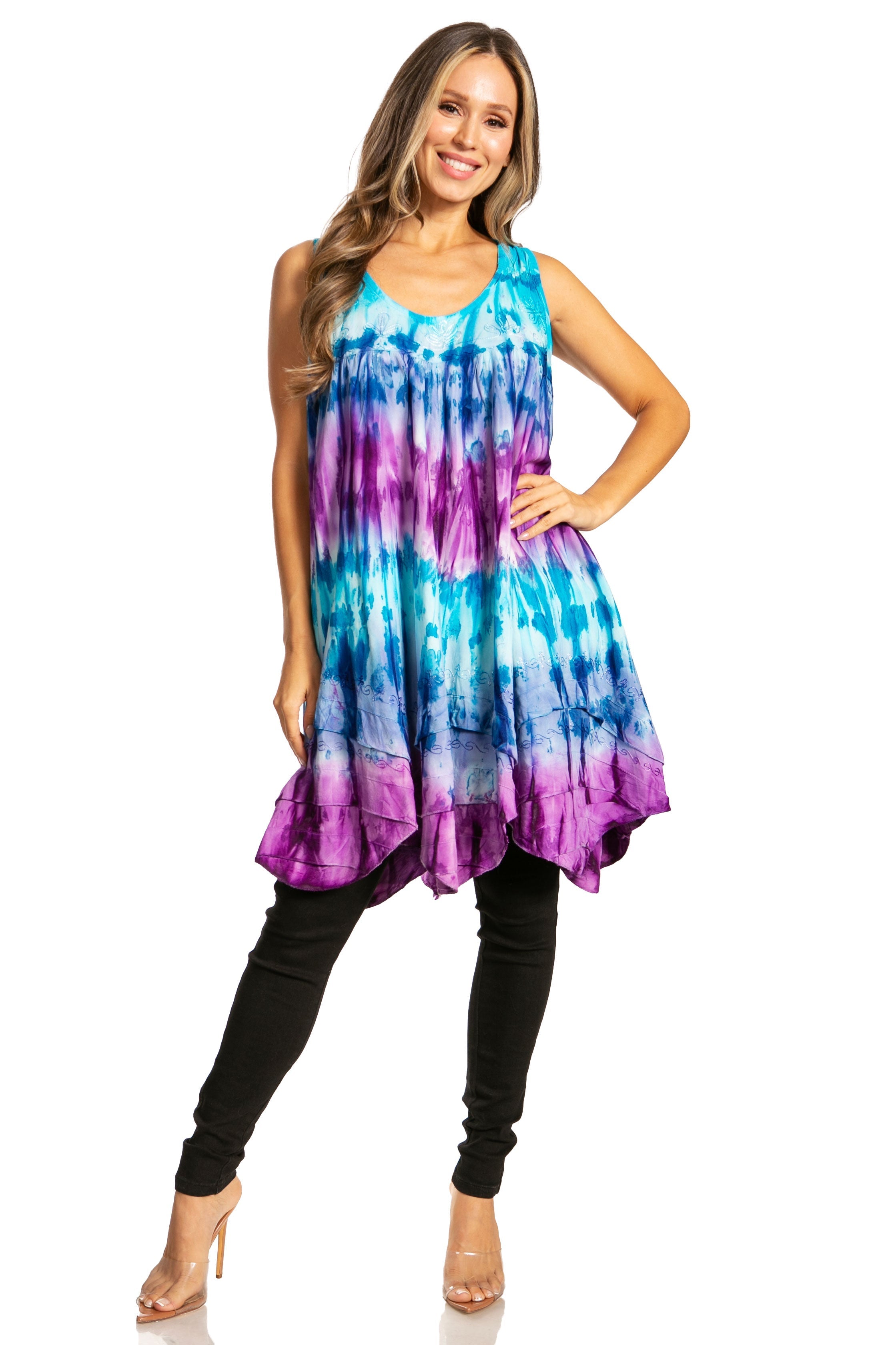 Woman wearing a tie-dye dress with a white background