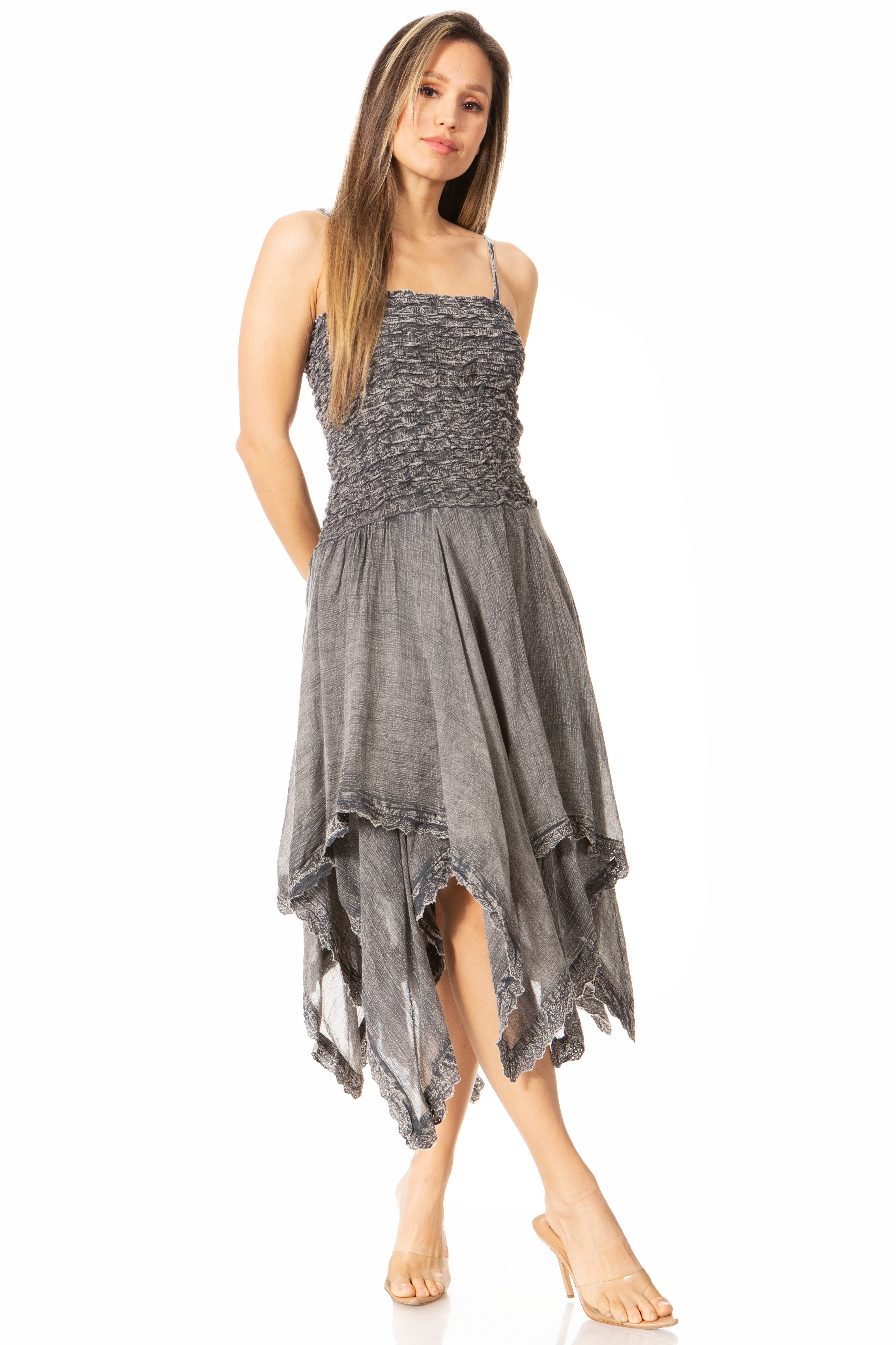 Woman wearing a gray dress on a white background