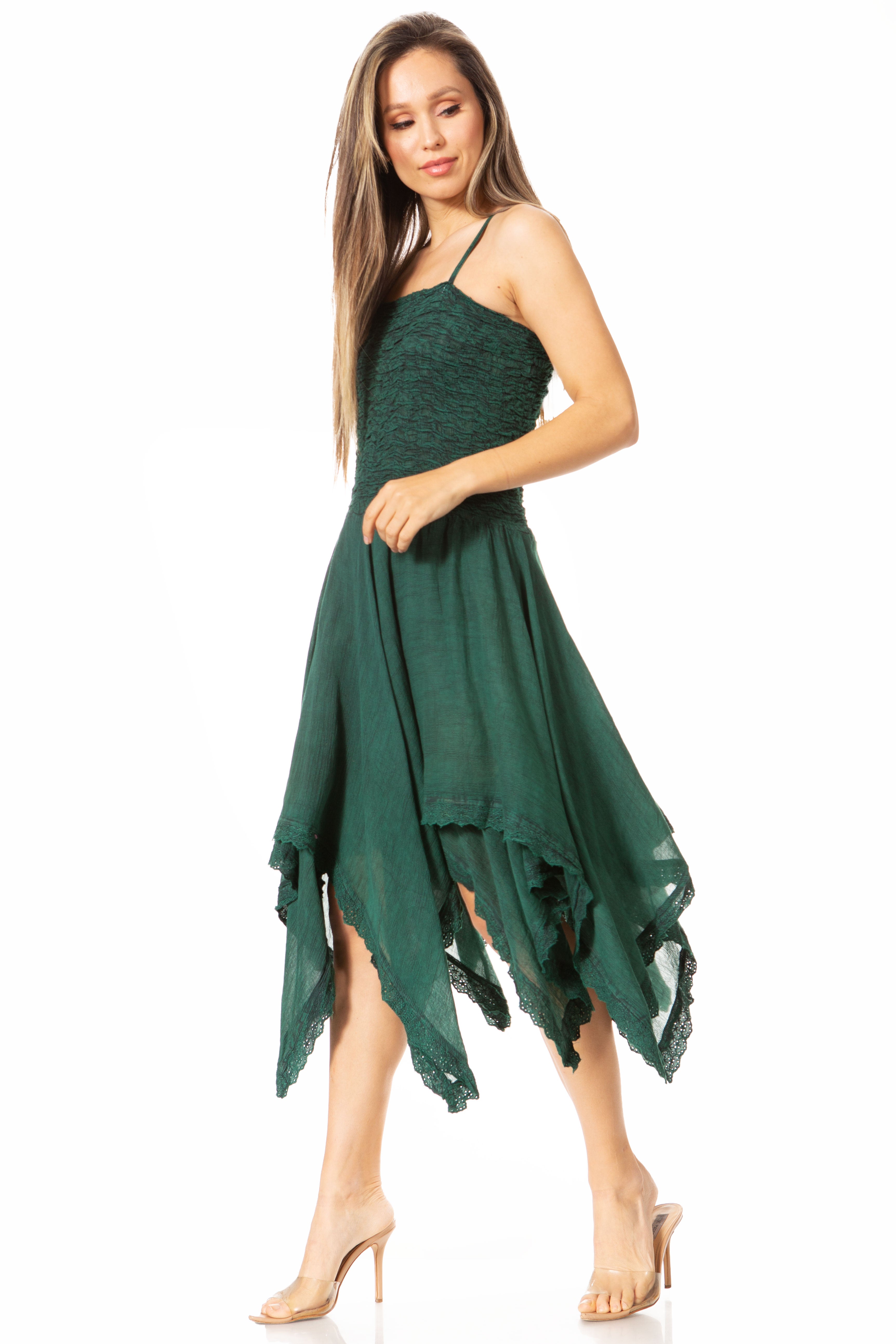 Woman wearing a green dress with a white background