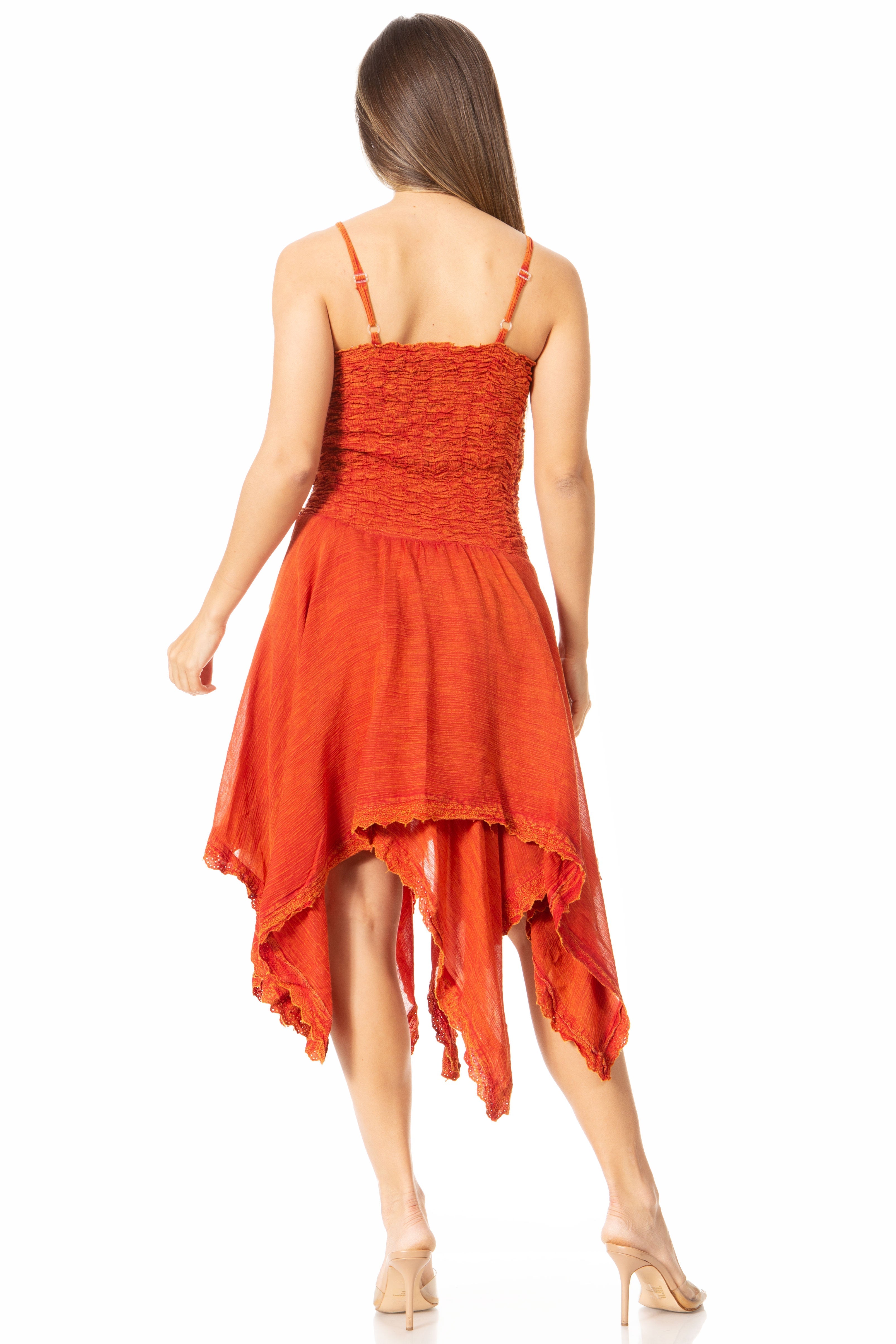 Woman wearing an orange dress on a white background