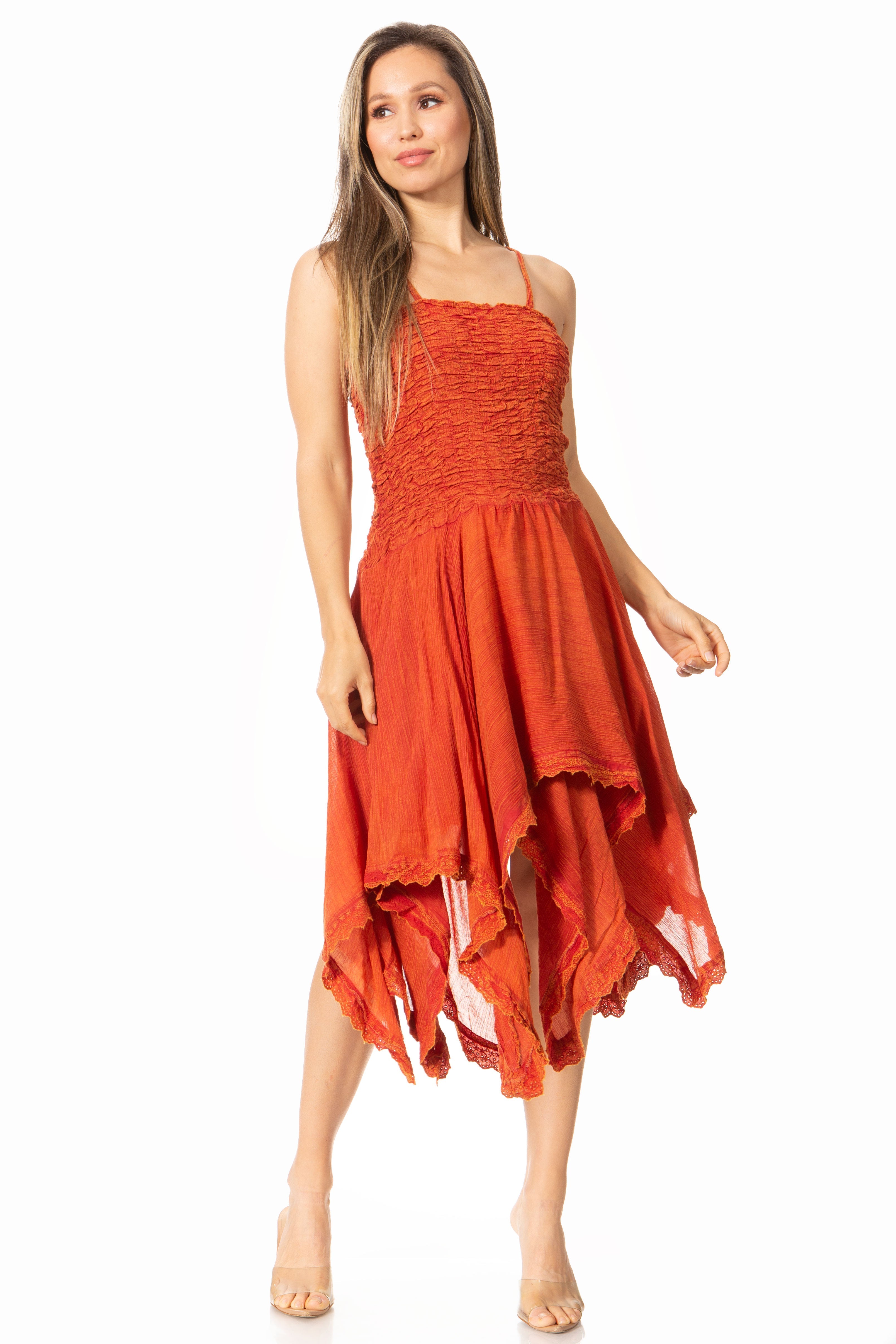 Woman wearing an orange dress on a white background