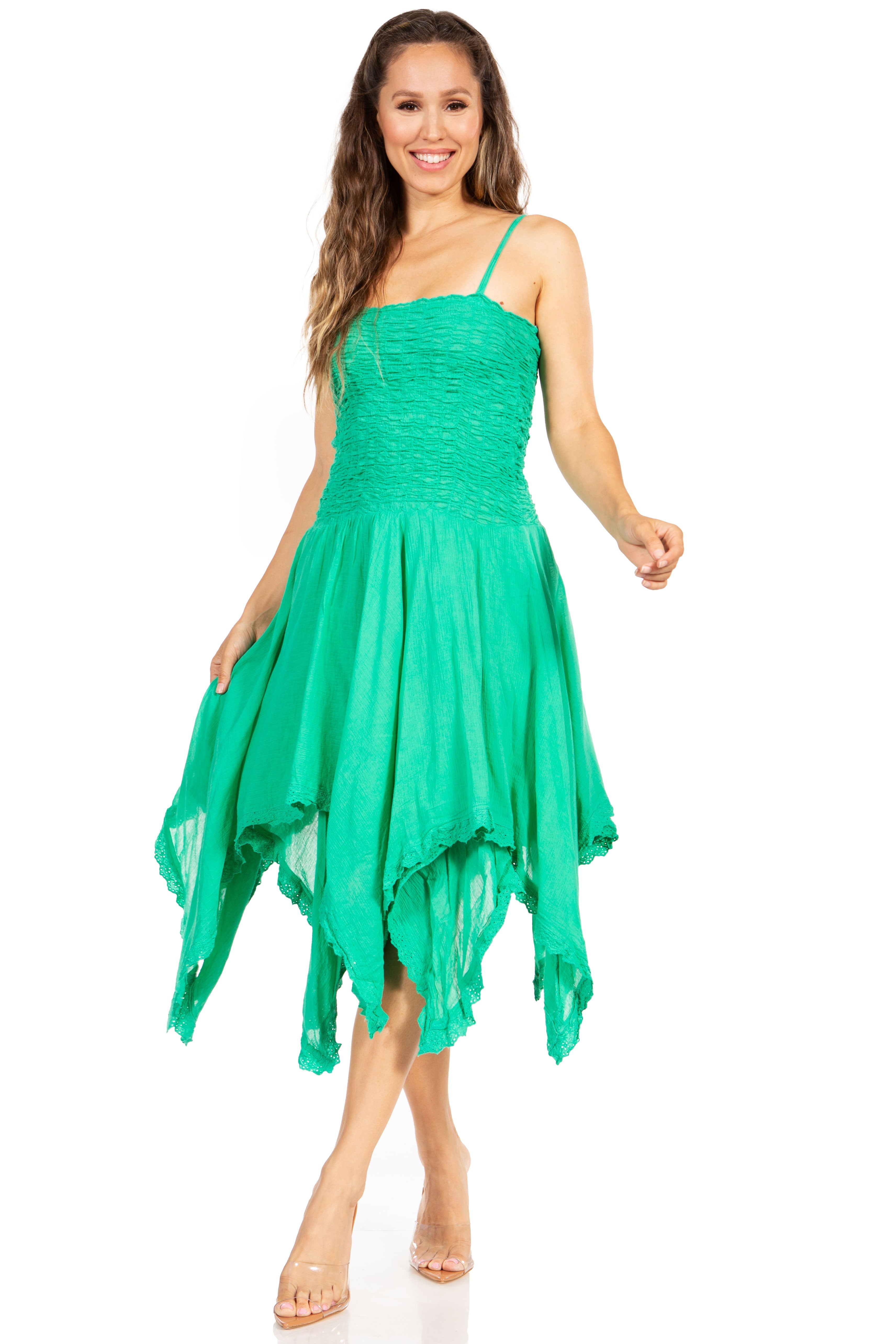 Woman wearing a green dress on a white background
