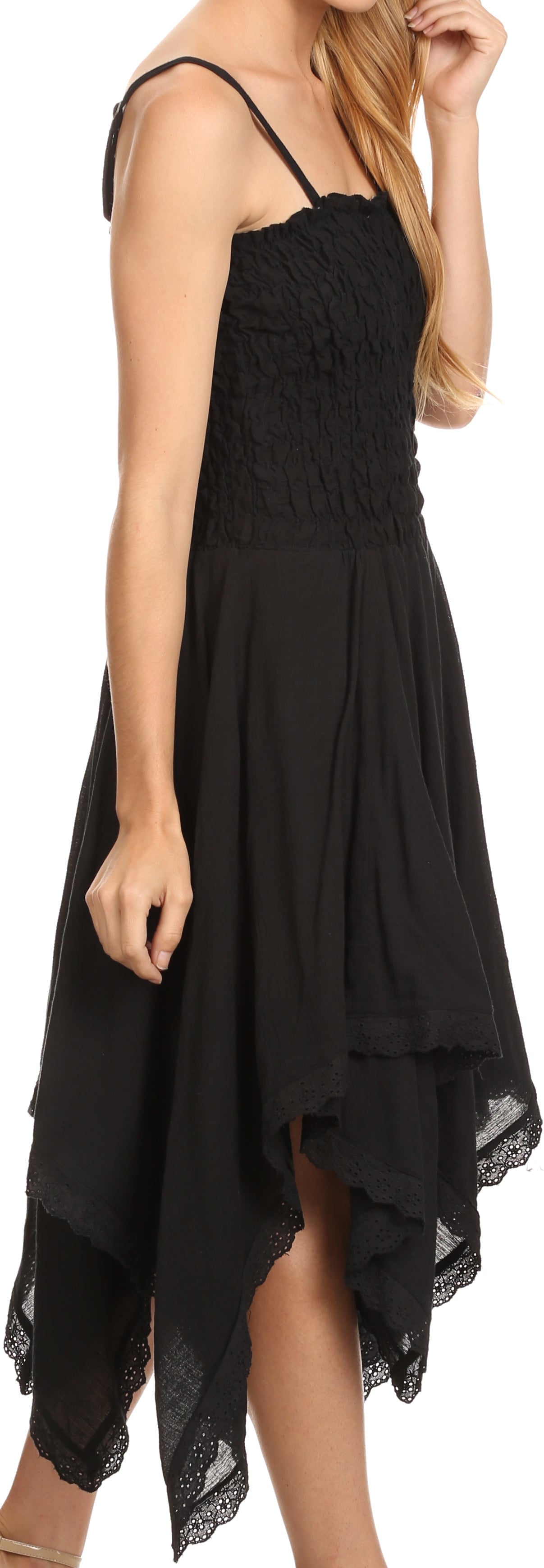 Black lace dress worn by a model against a neutral background