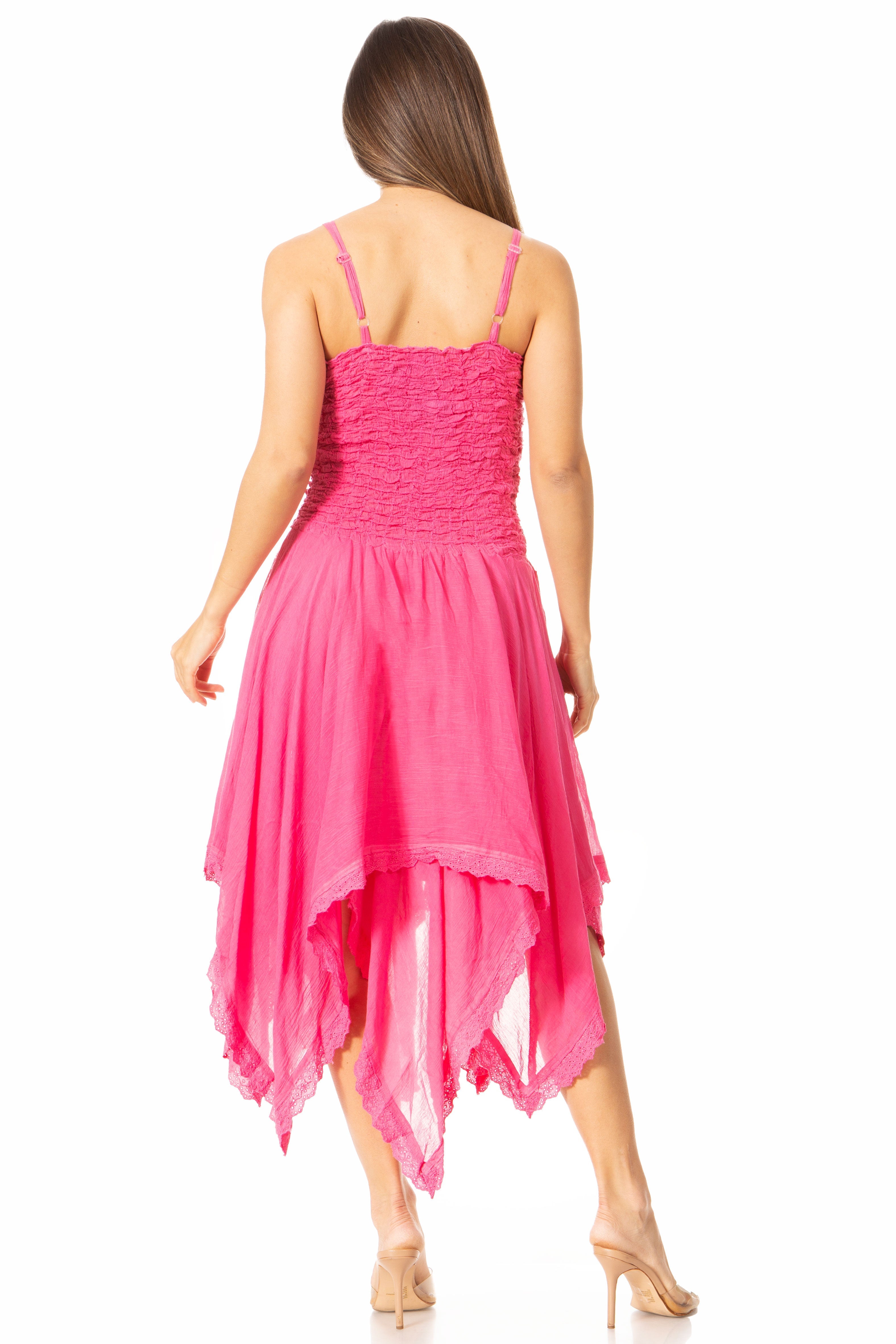 Woman wearing a pink dress on a white background