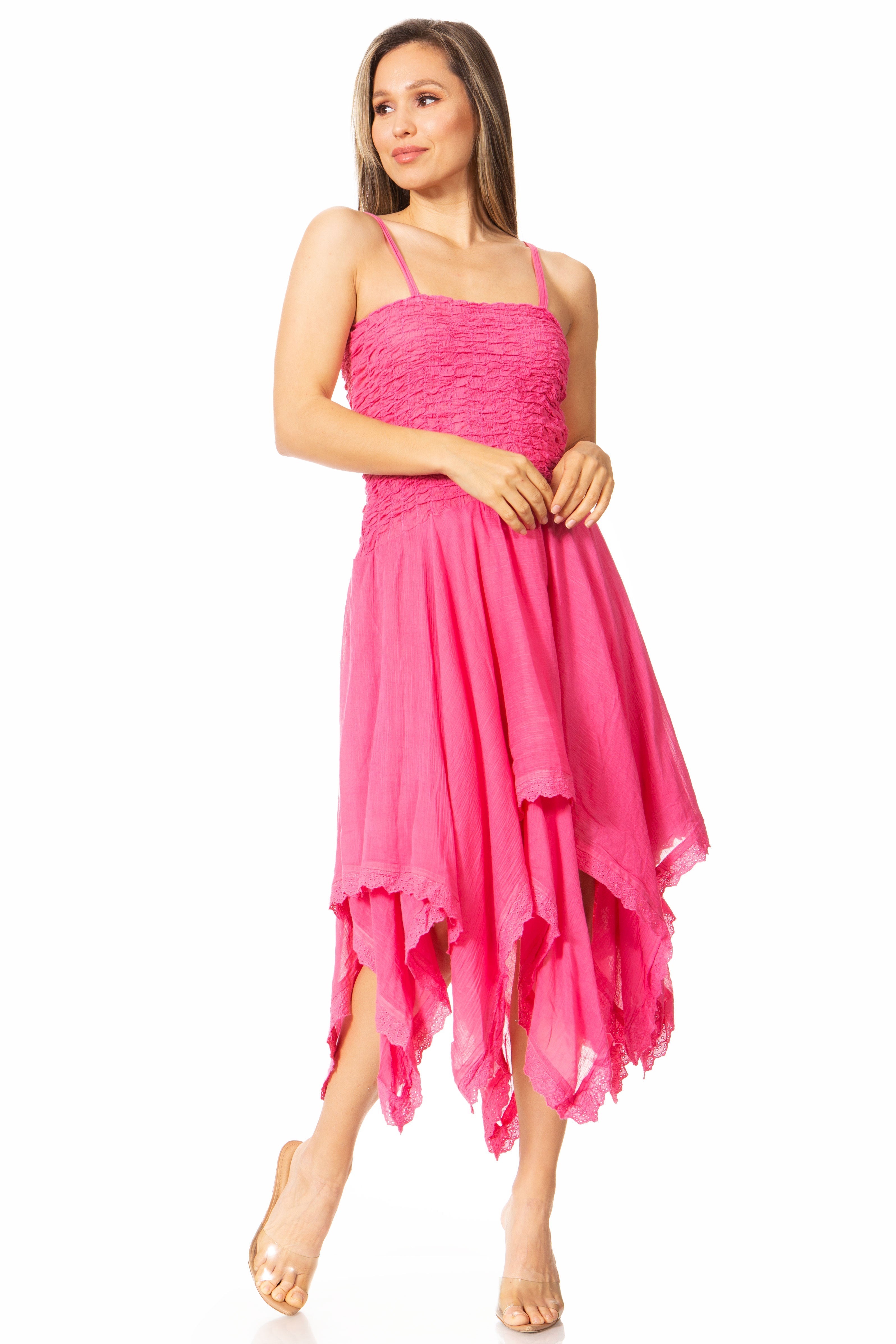 Woman wearing a pink dress on a white background