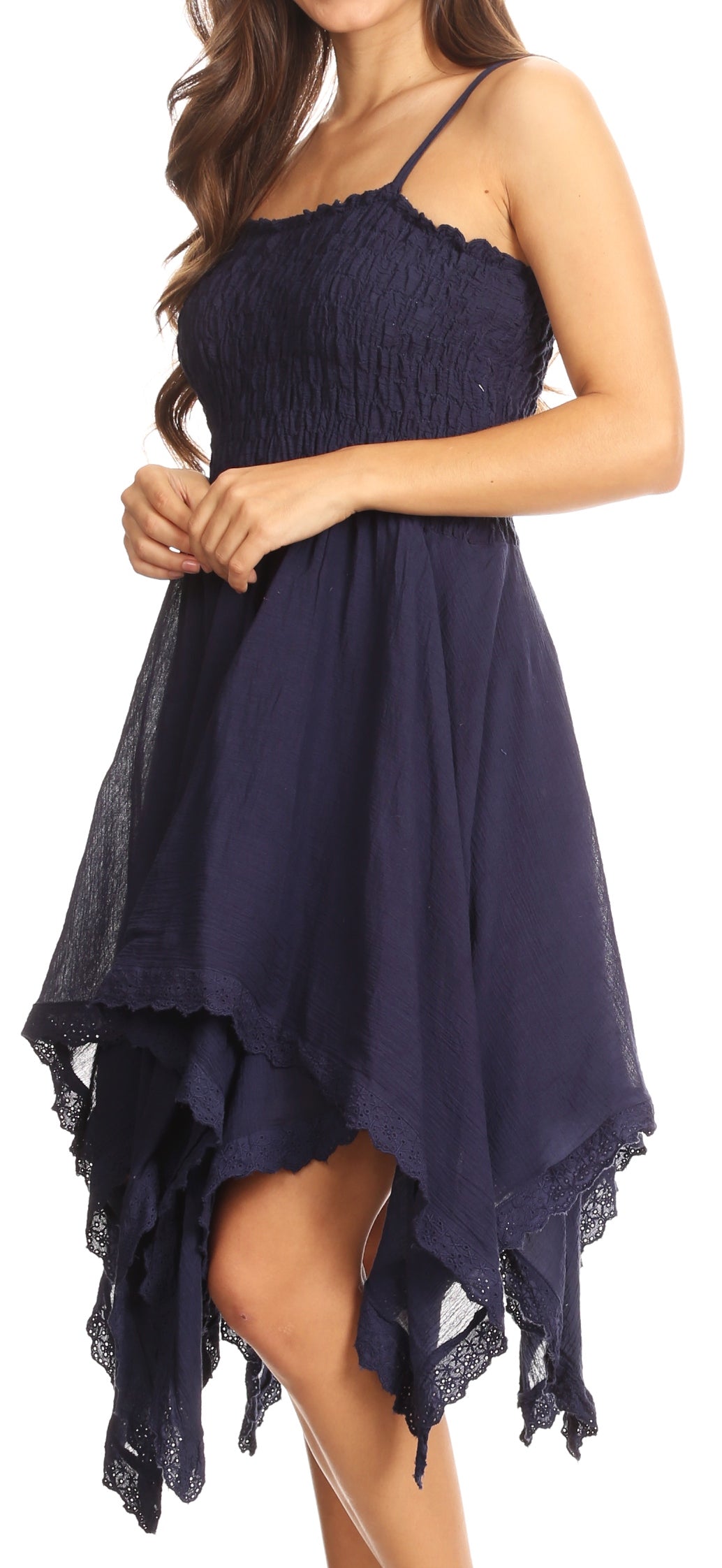 Navy blue dress with lace details on a white background