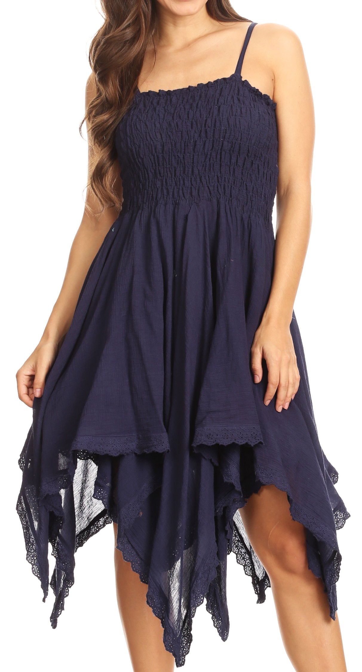 Navy blue dress with lace details on a white background