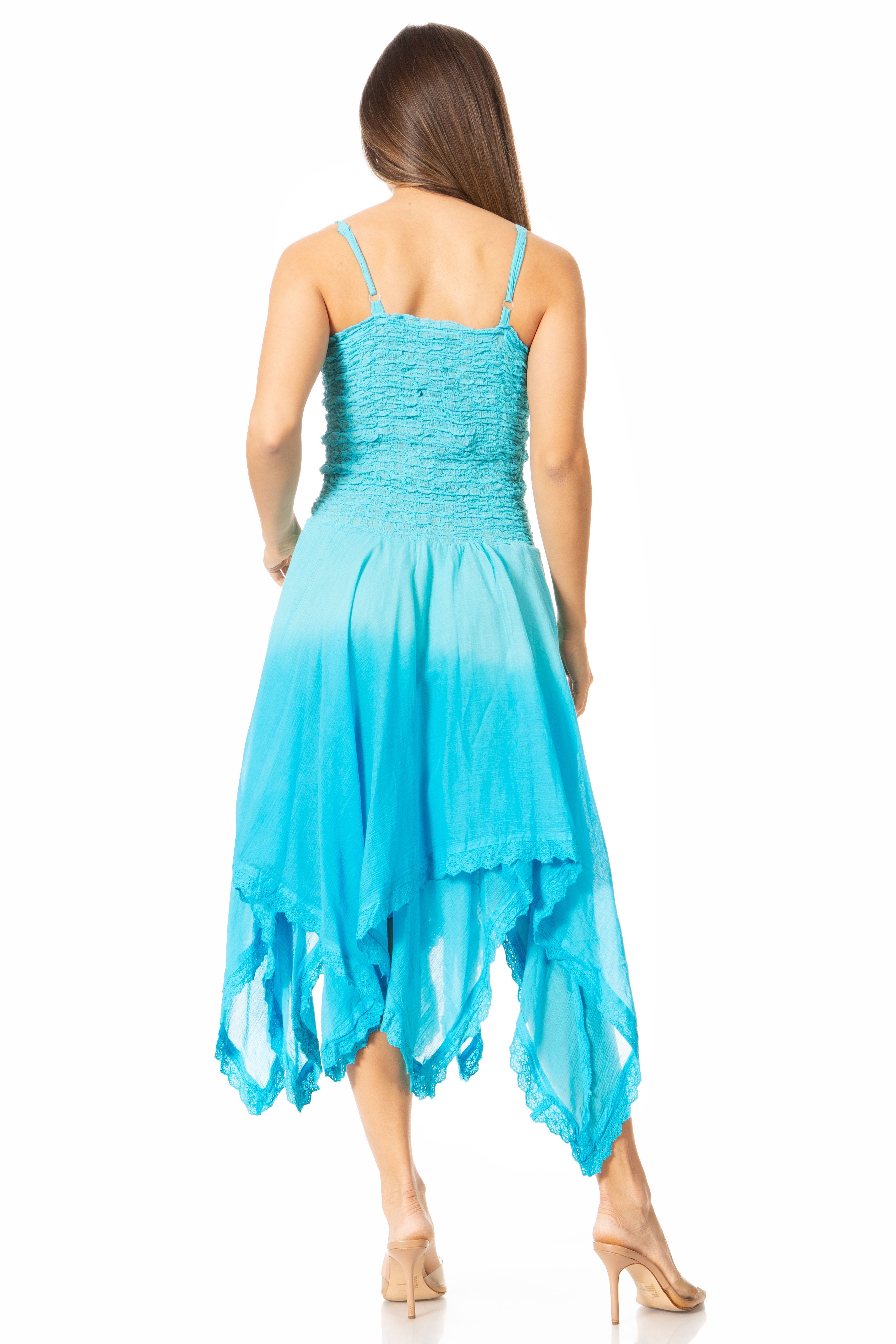 Woman wearing a blue dress with a white background