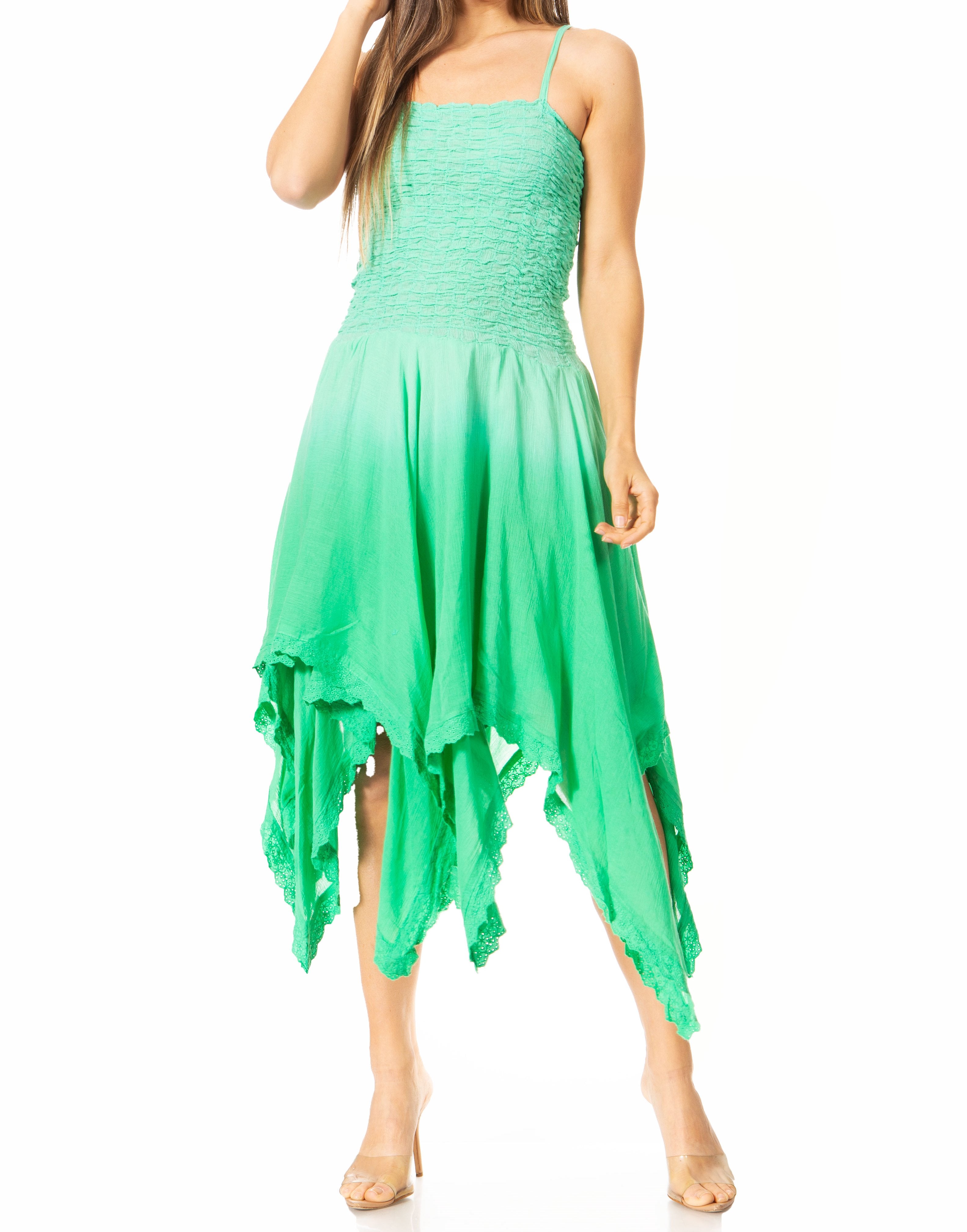 Green dress with an asymmetrical hem on a white background
