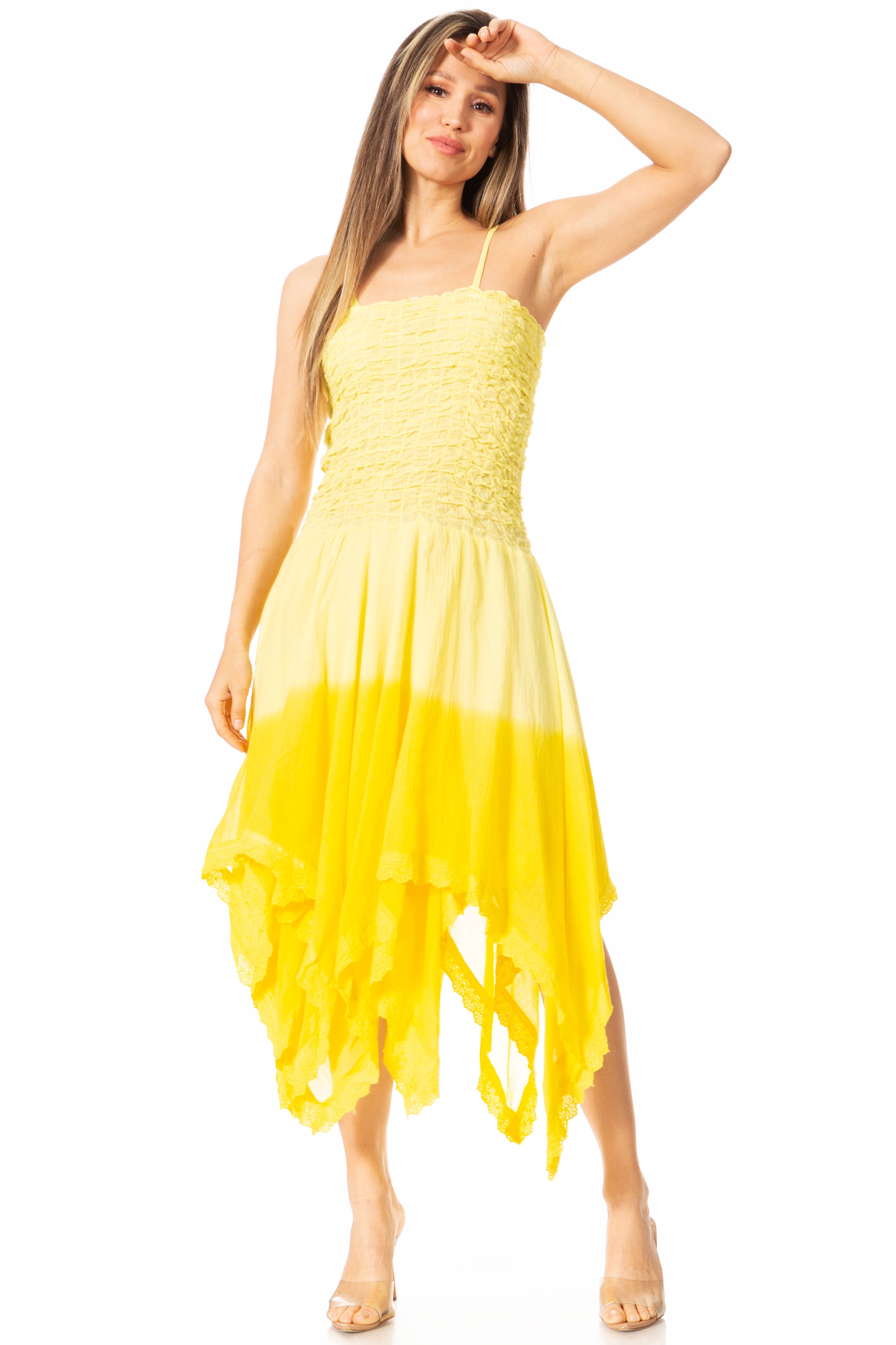 Woman wearing a yellow dress with a gradient effect on a white background