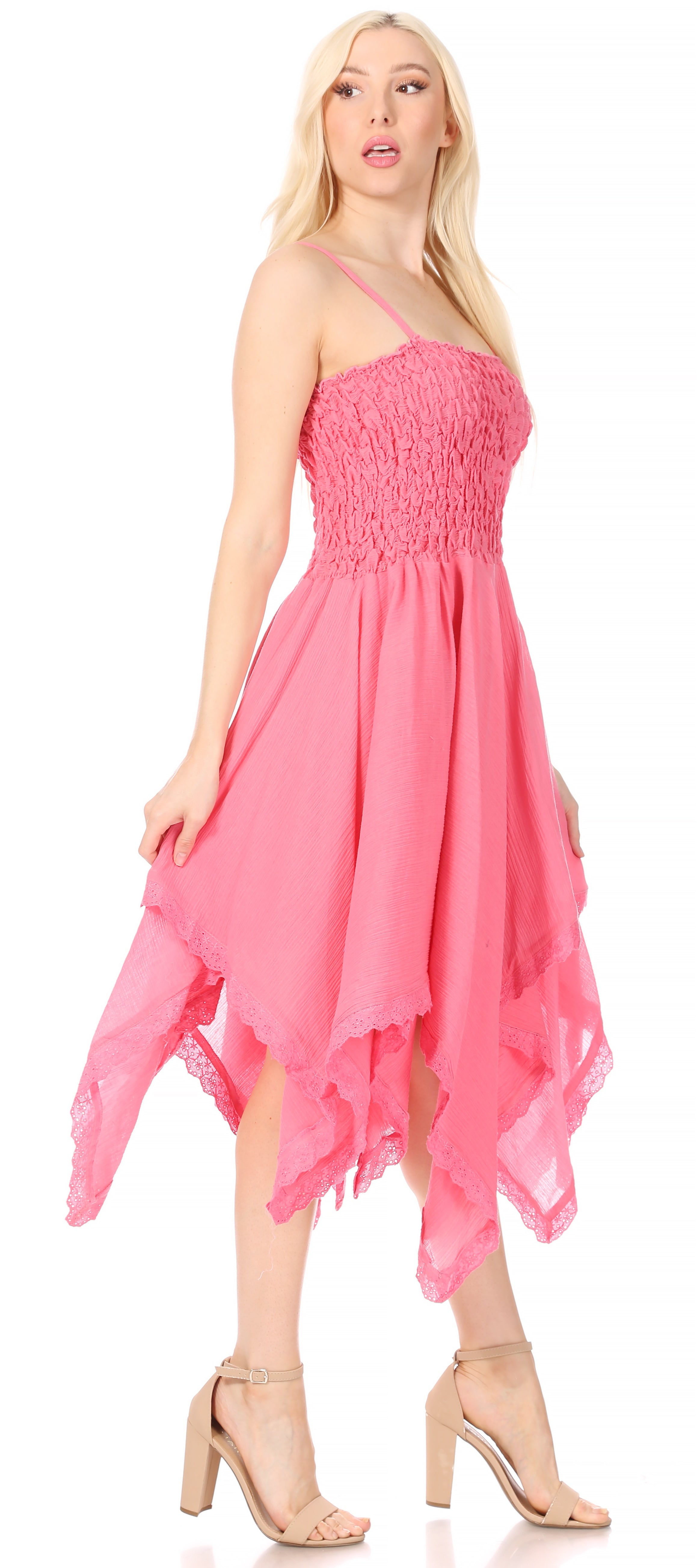 Woman wearing a pink dress on a white background