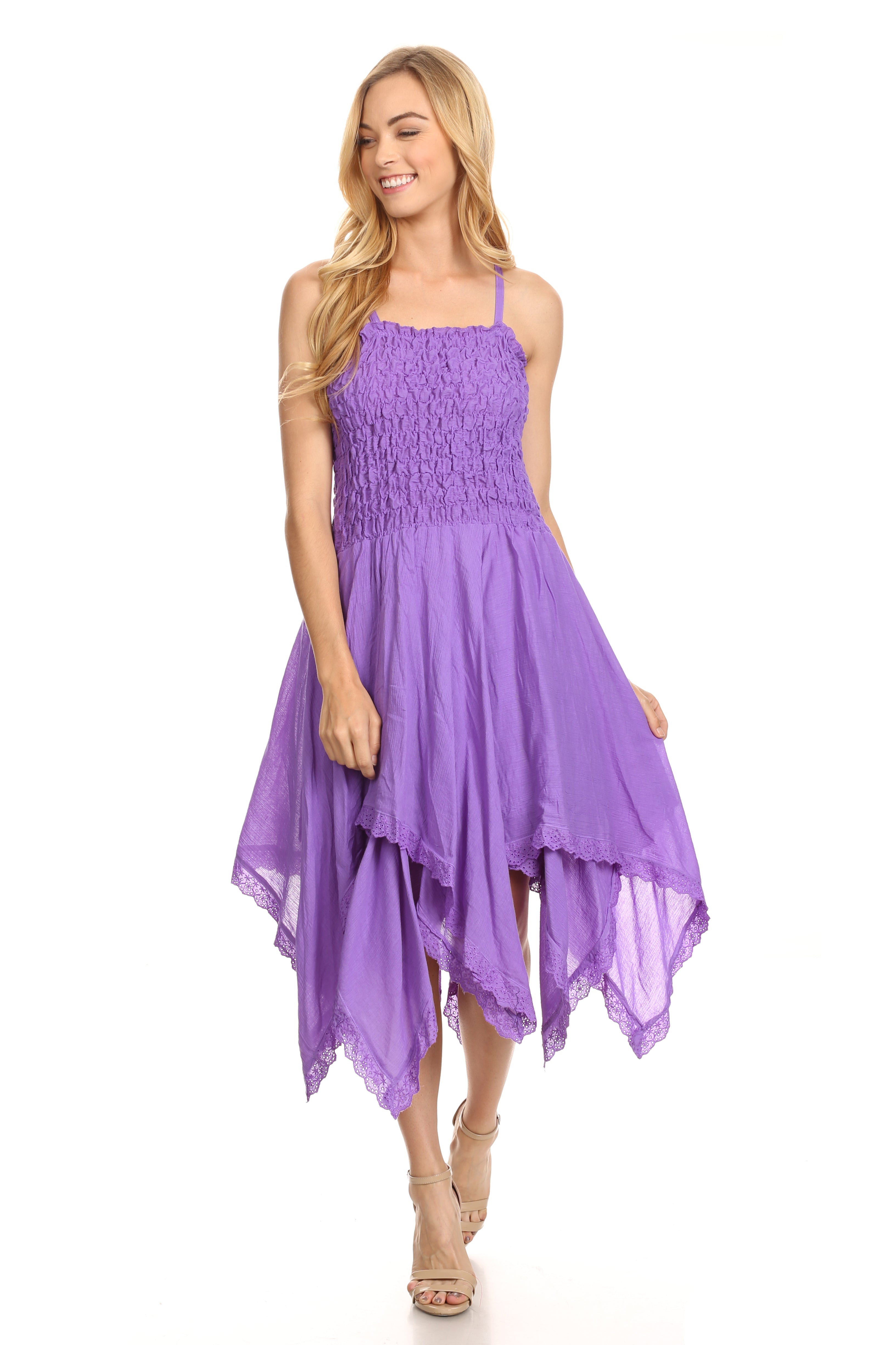 Woman wearing a purple dress on a white background