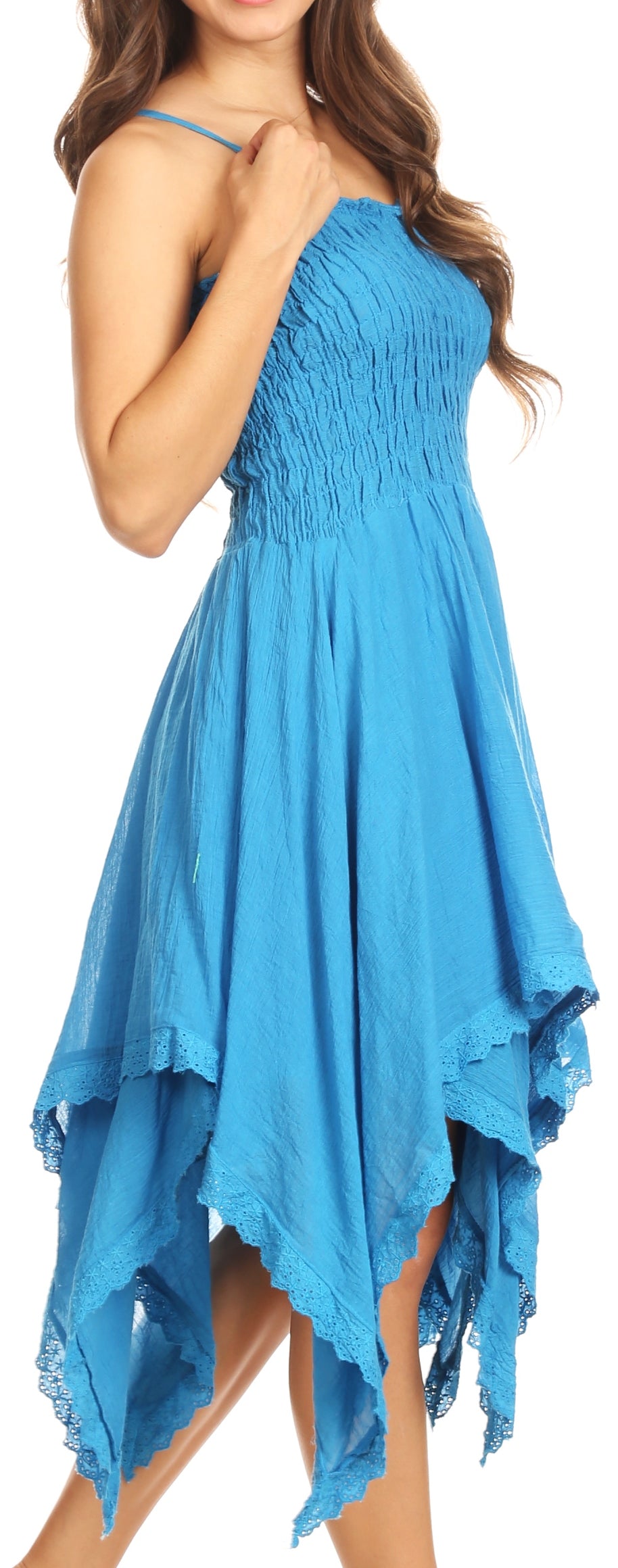 Woman wearing a blue dress with a high-low hem design.