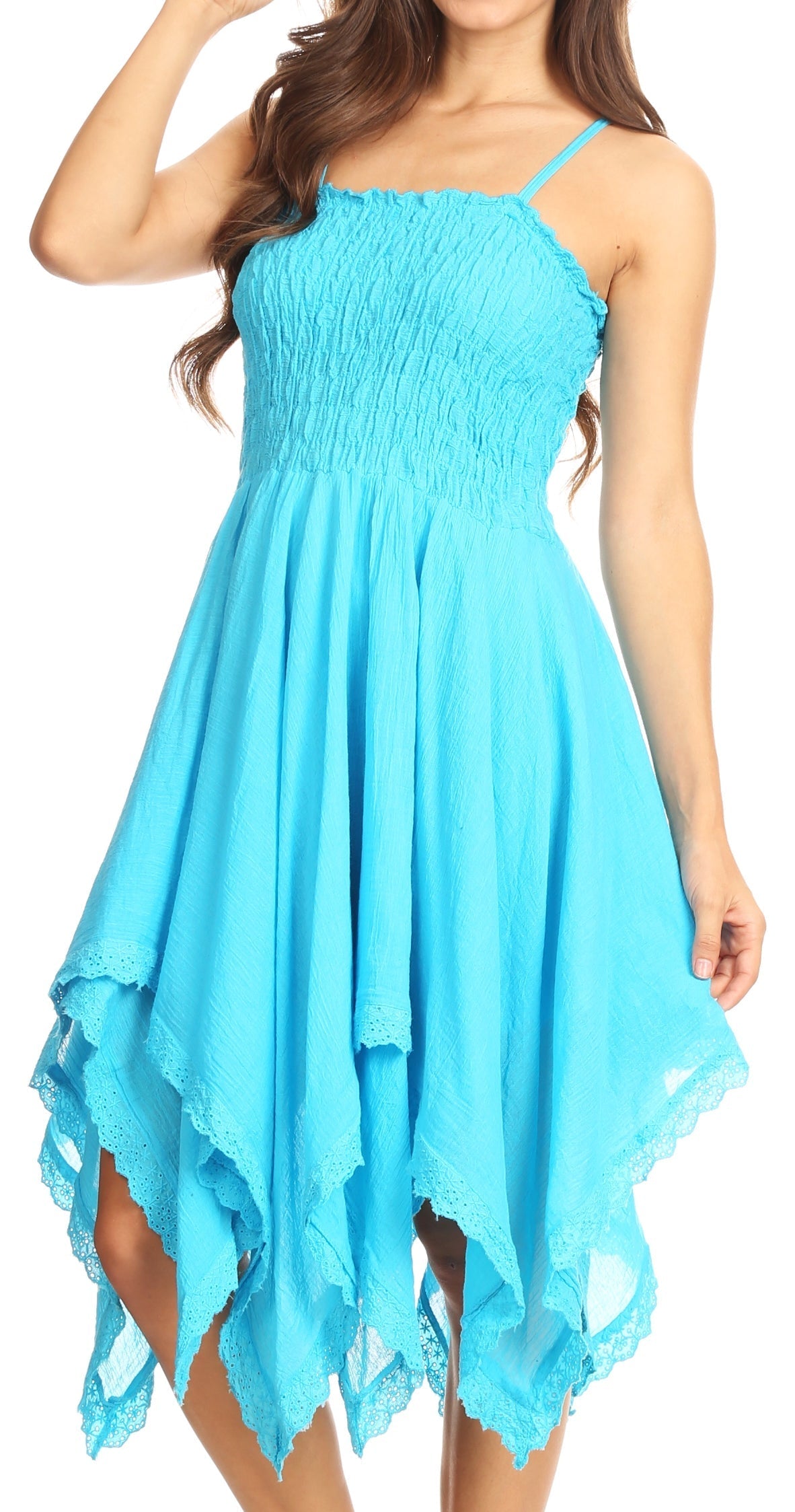 Woman wearing a blue dress with a white background