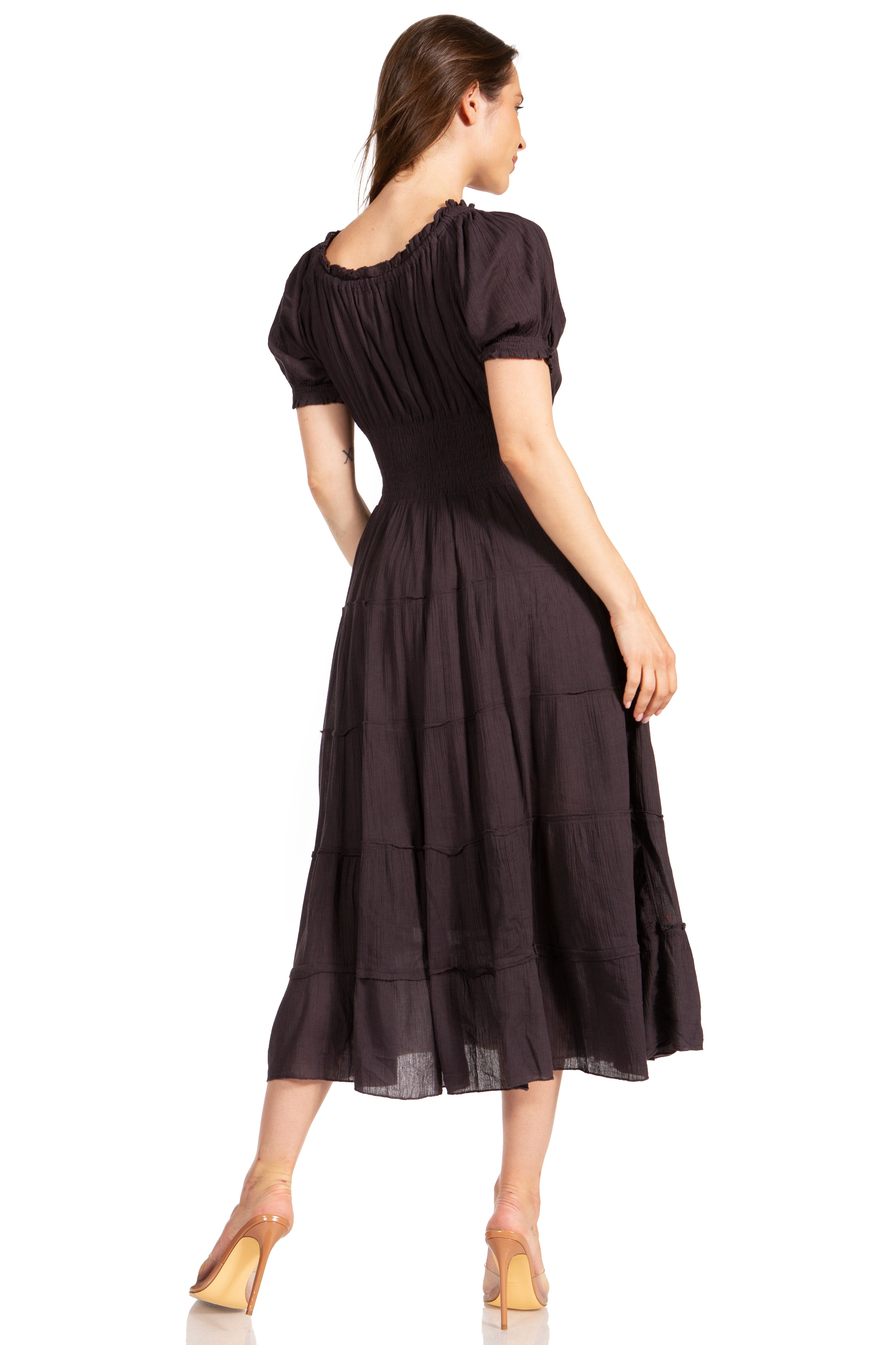 Woman wearing a dark brown dress on a white background