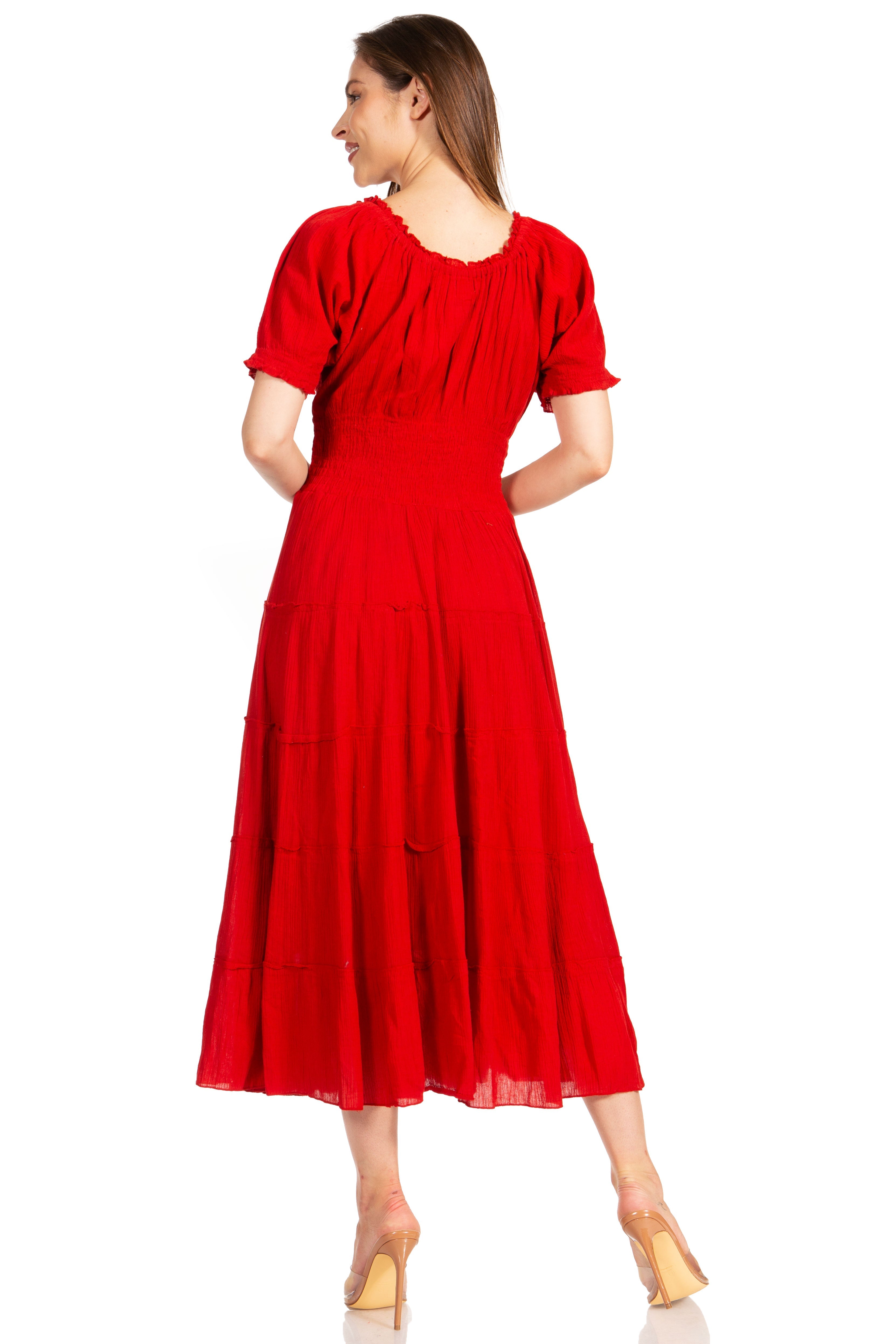 Red dress worn by a model on a white background