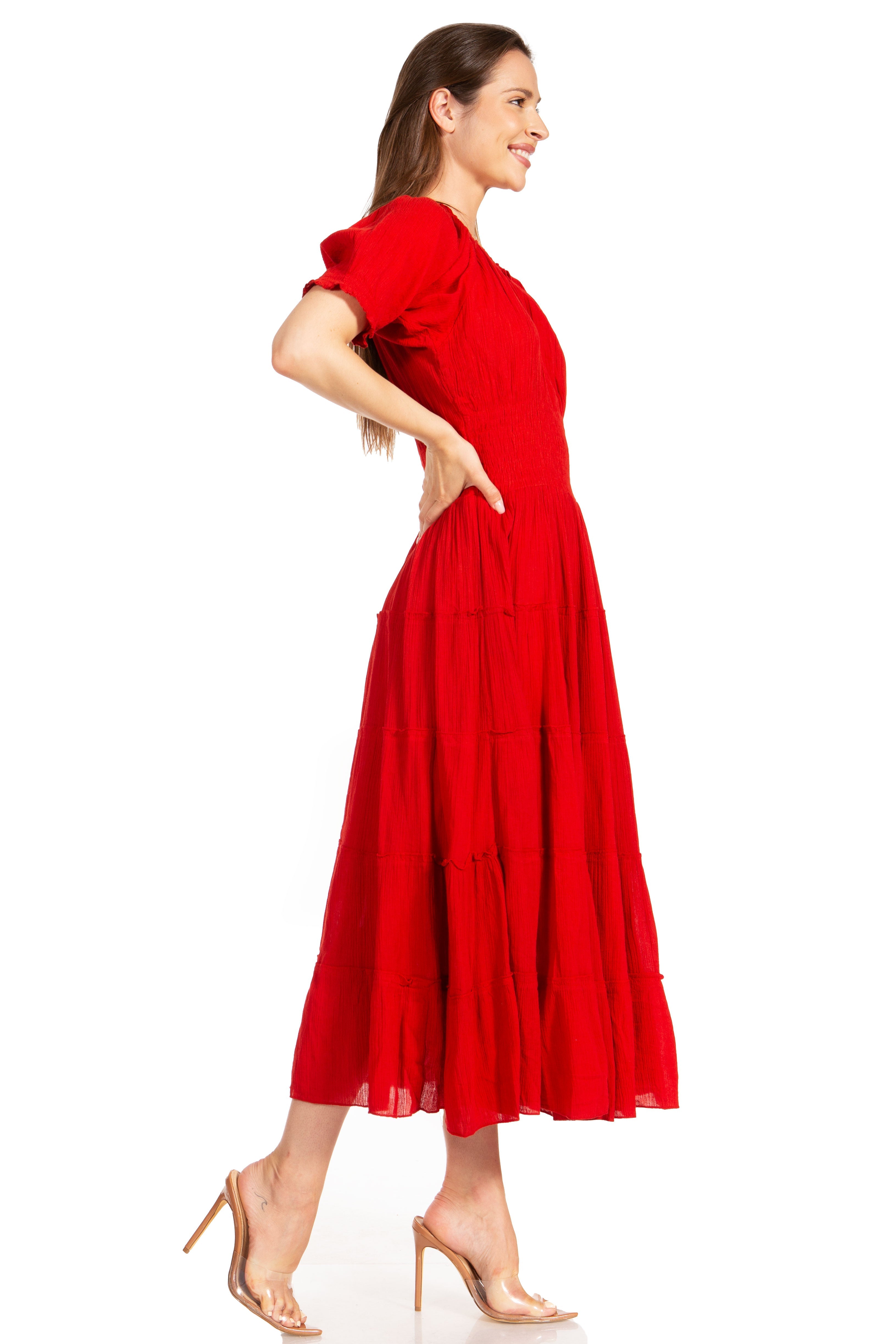 Woman wearing a red dress on a white background