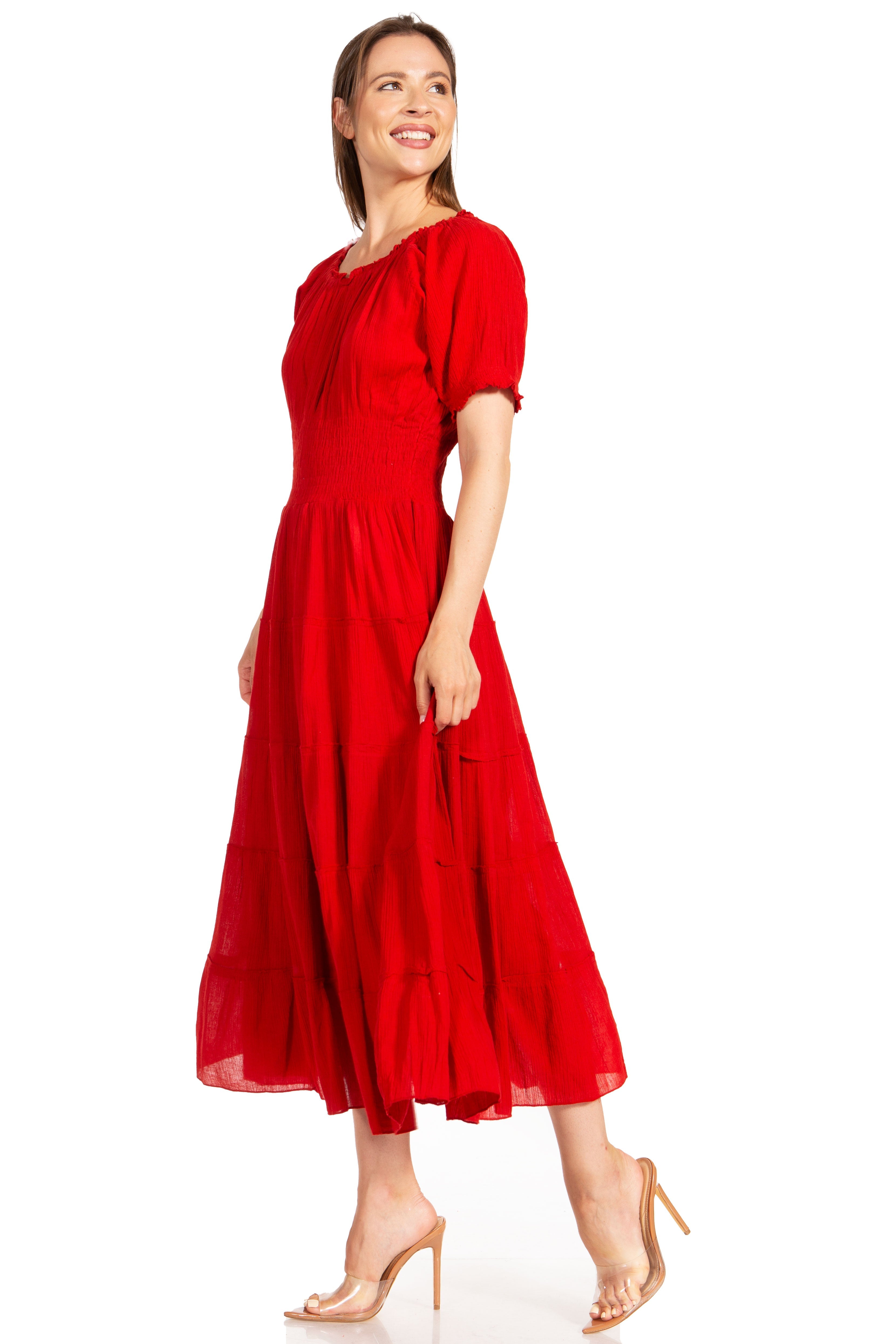 Woman wearing a red dress on a white background