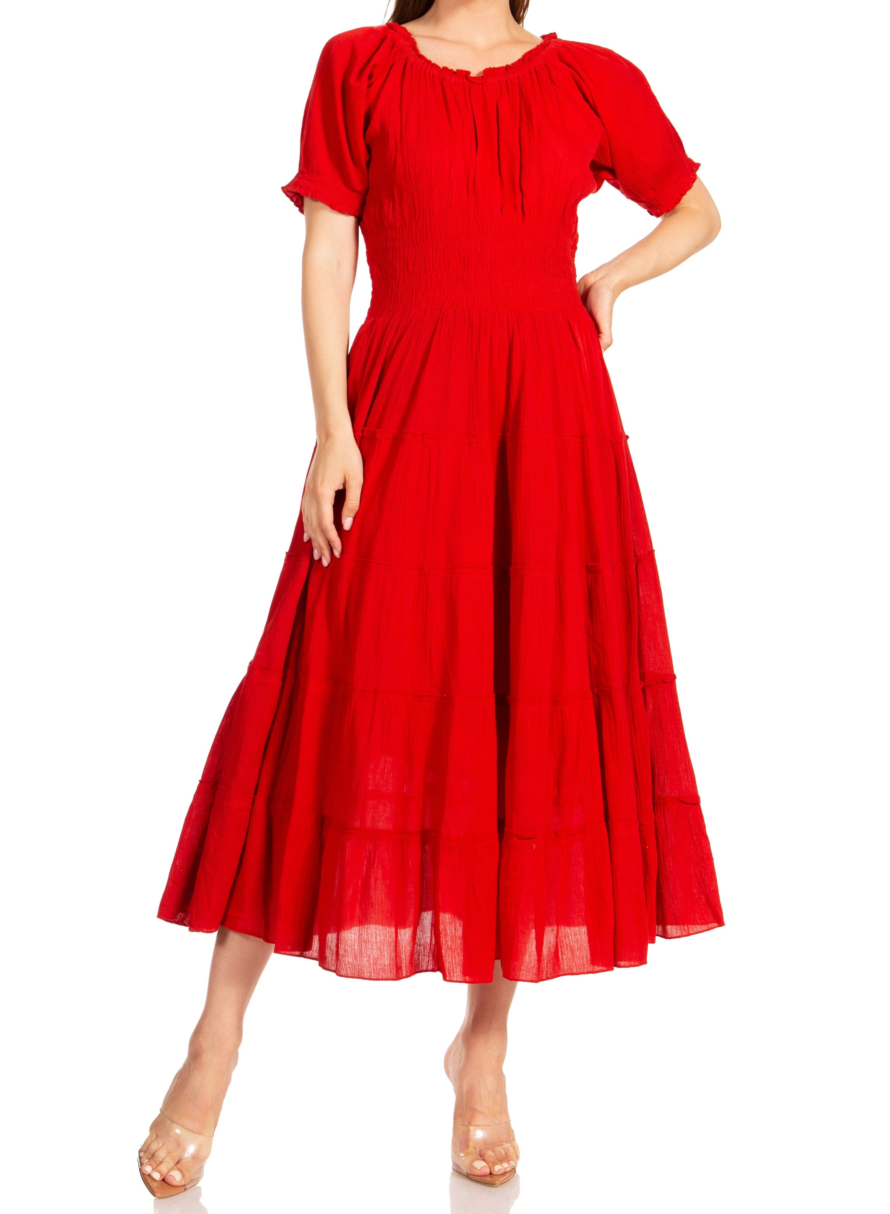 Red dress worn by a model on a white background