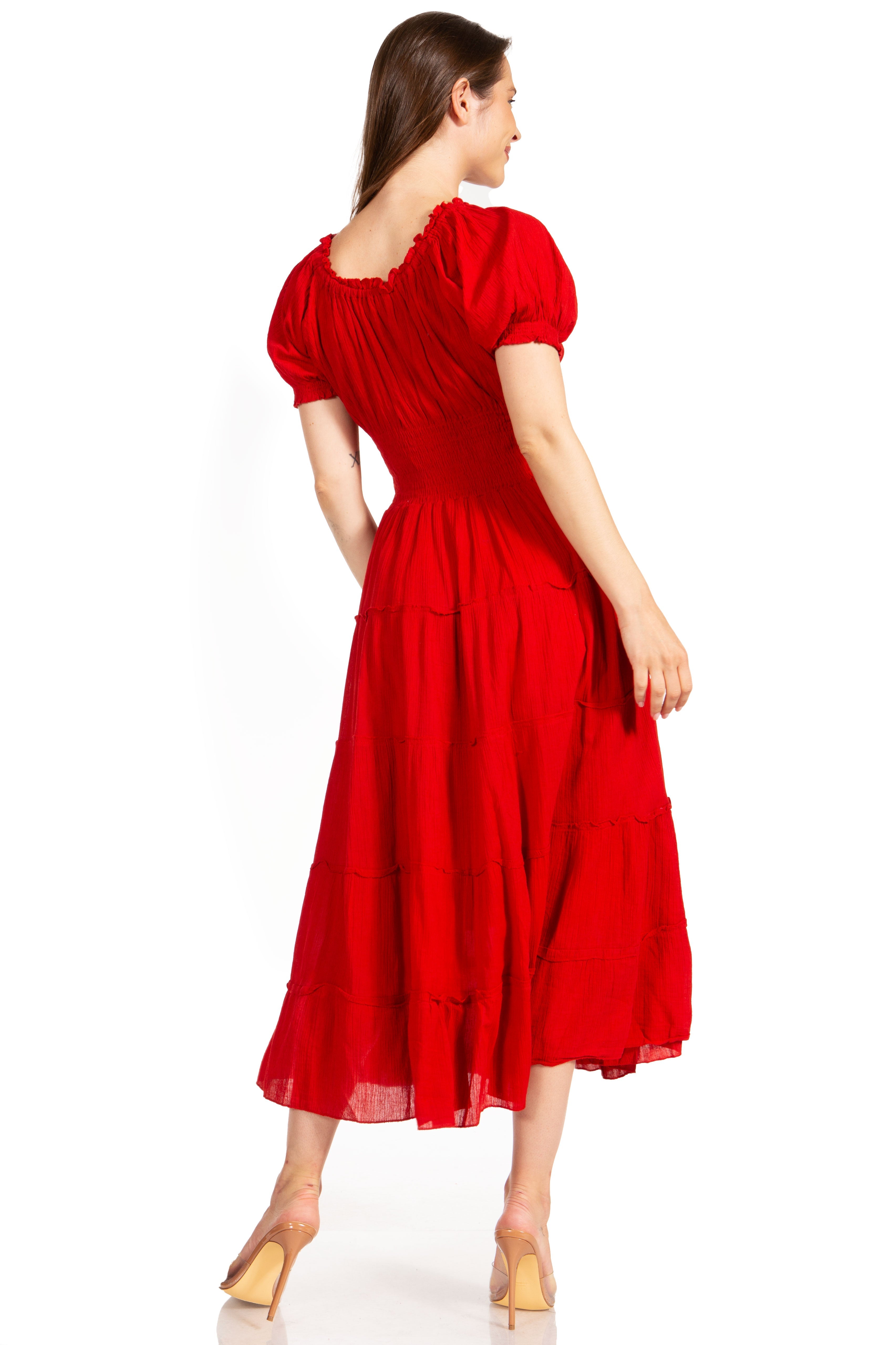 Woman wearing a red dress on a white background