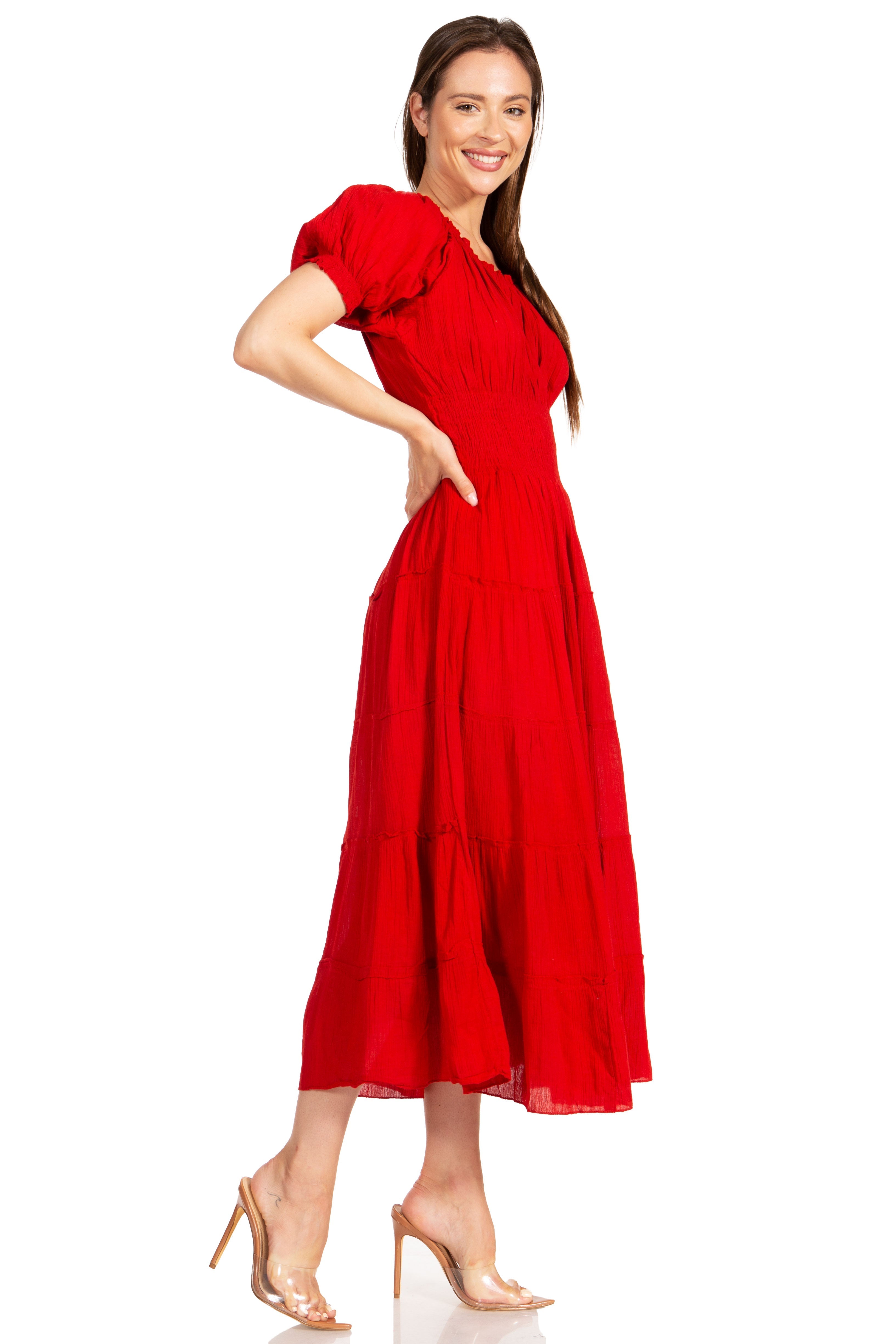 Woman wearing a red dress on a white background