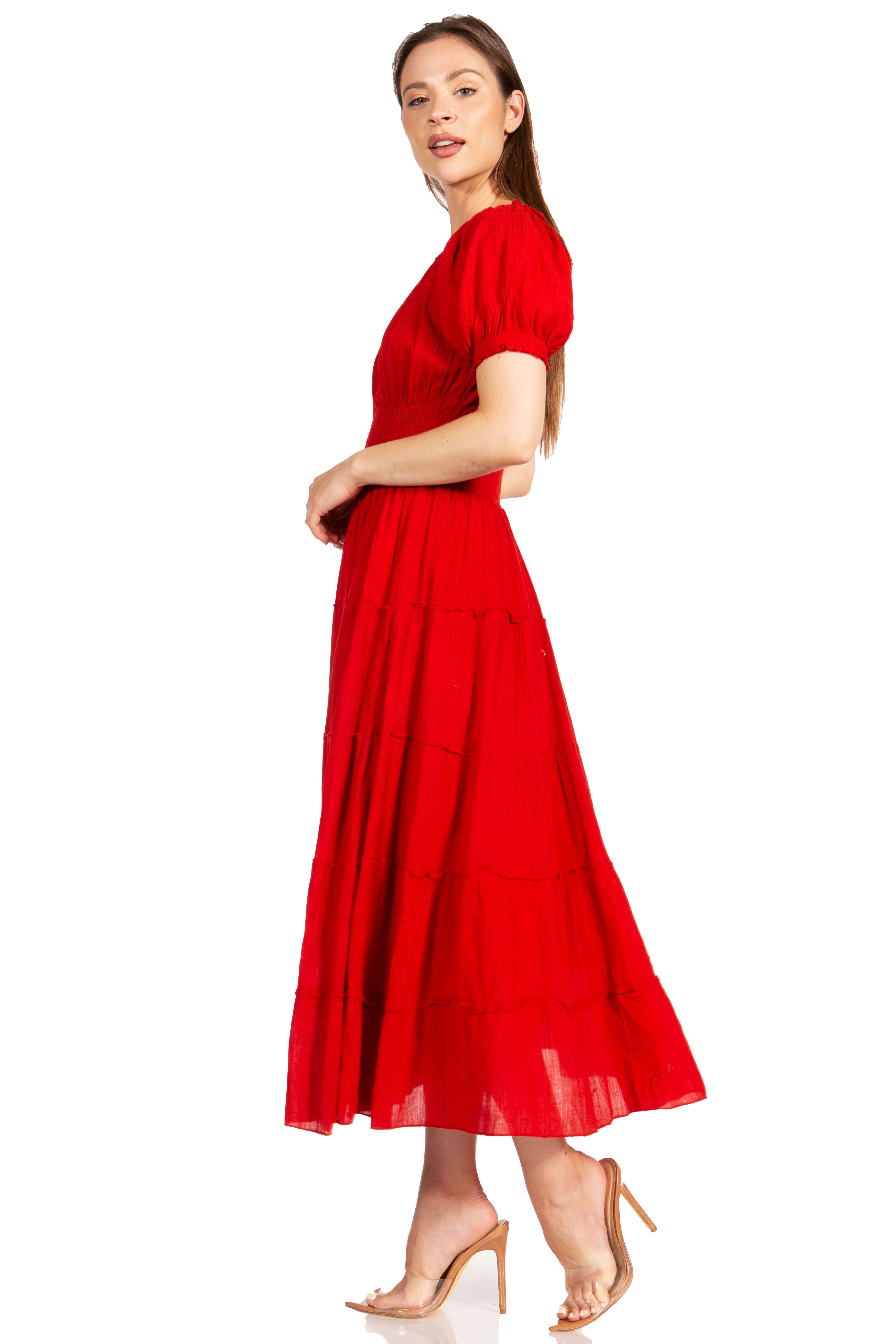 Woman wearing a red dress on a white background