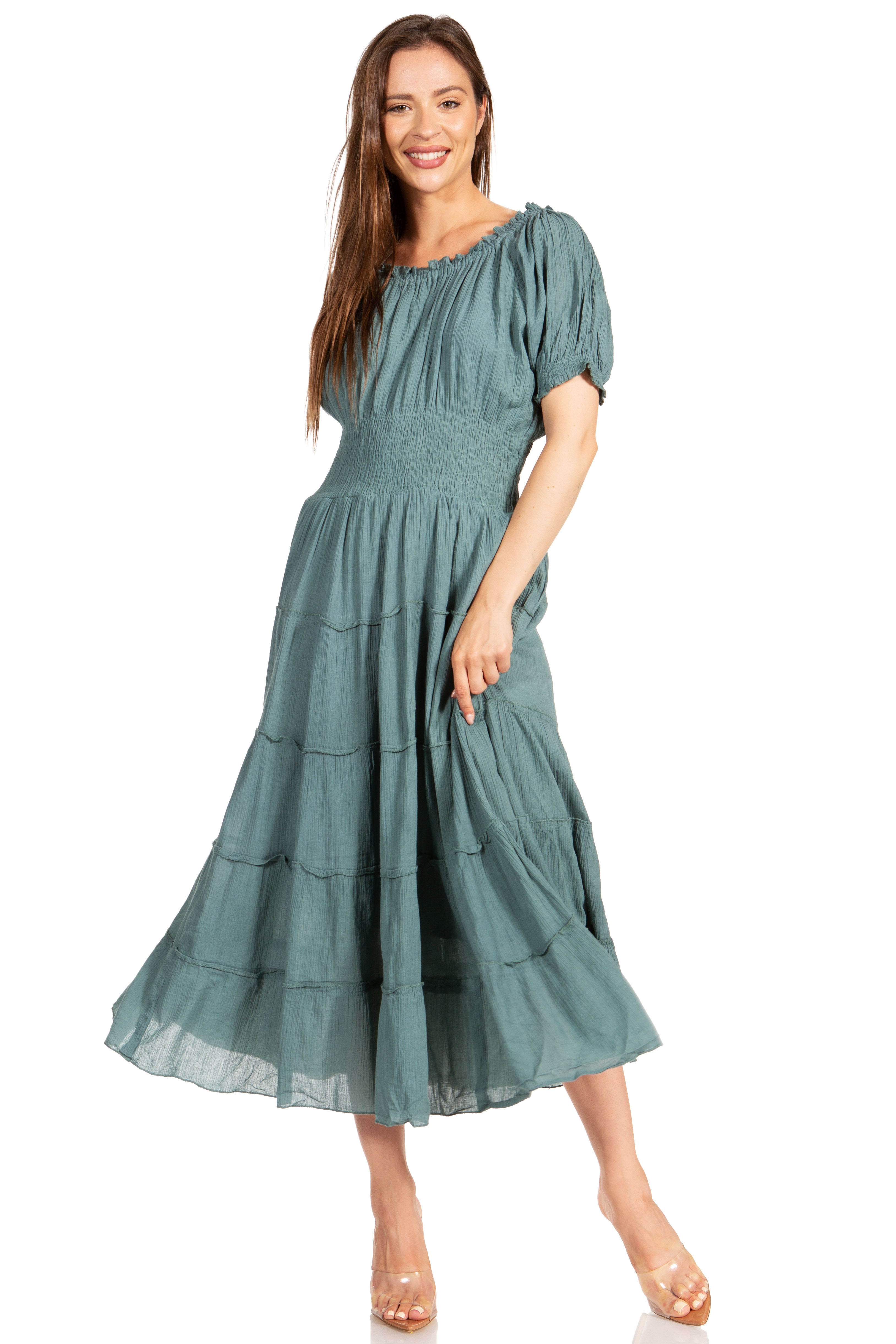 Woman wearing a green dress on a white background