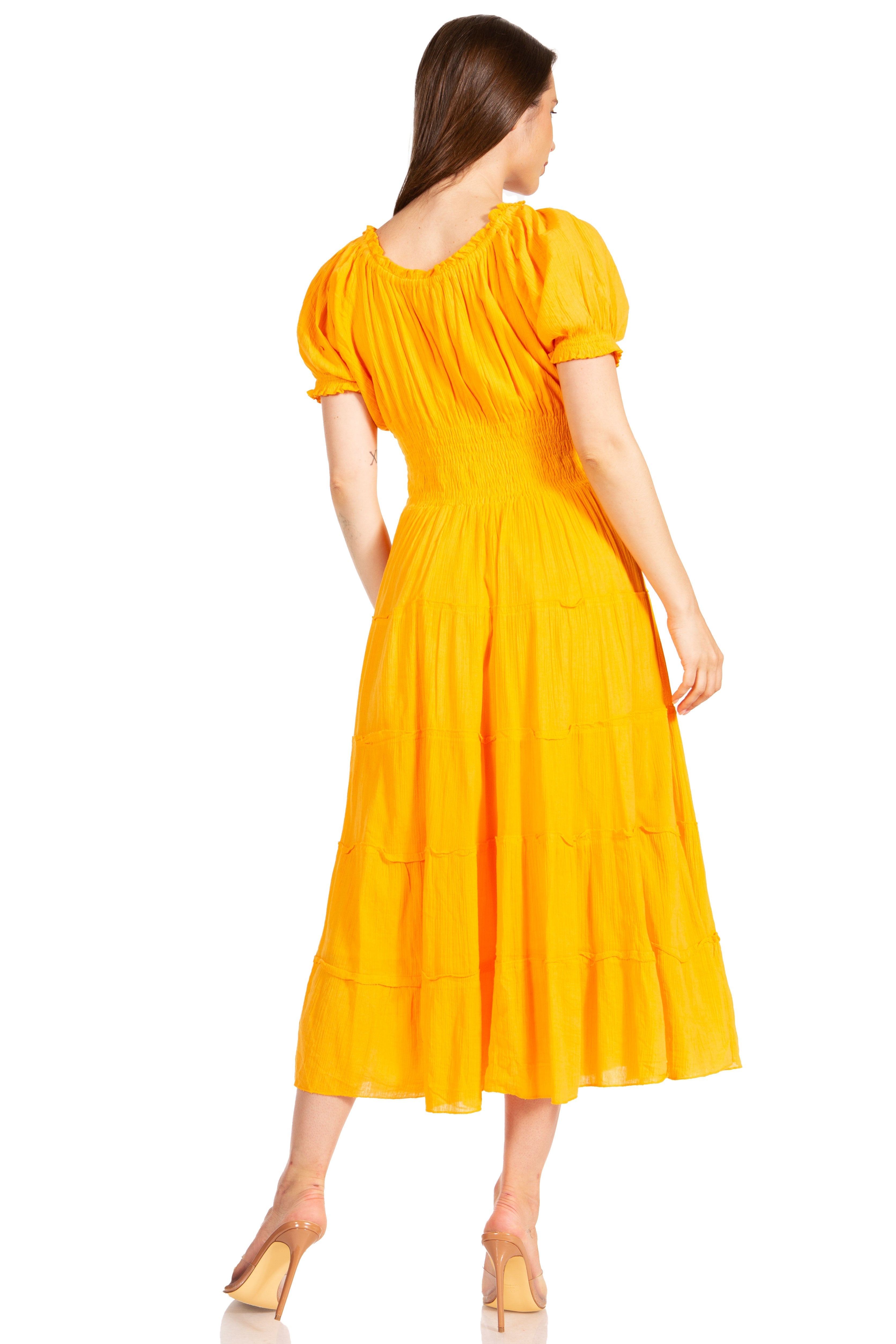 Woman wearing a yellow dress on a white background