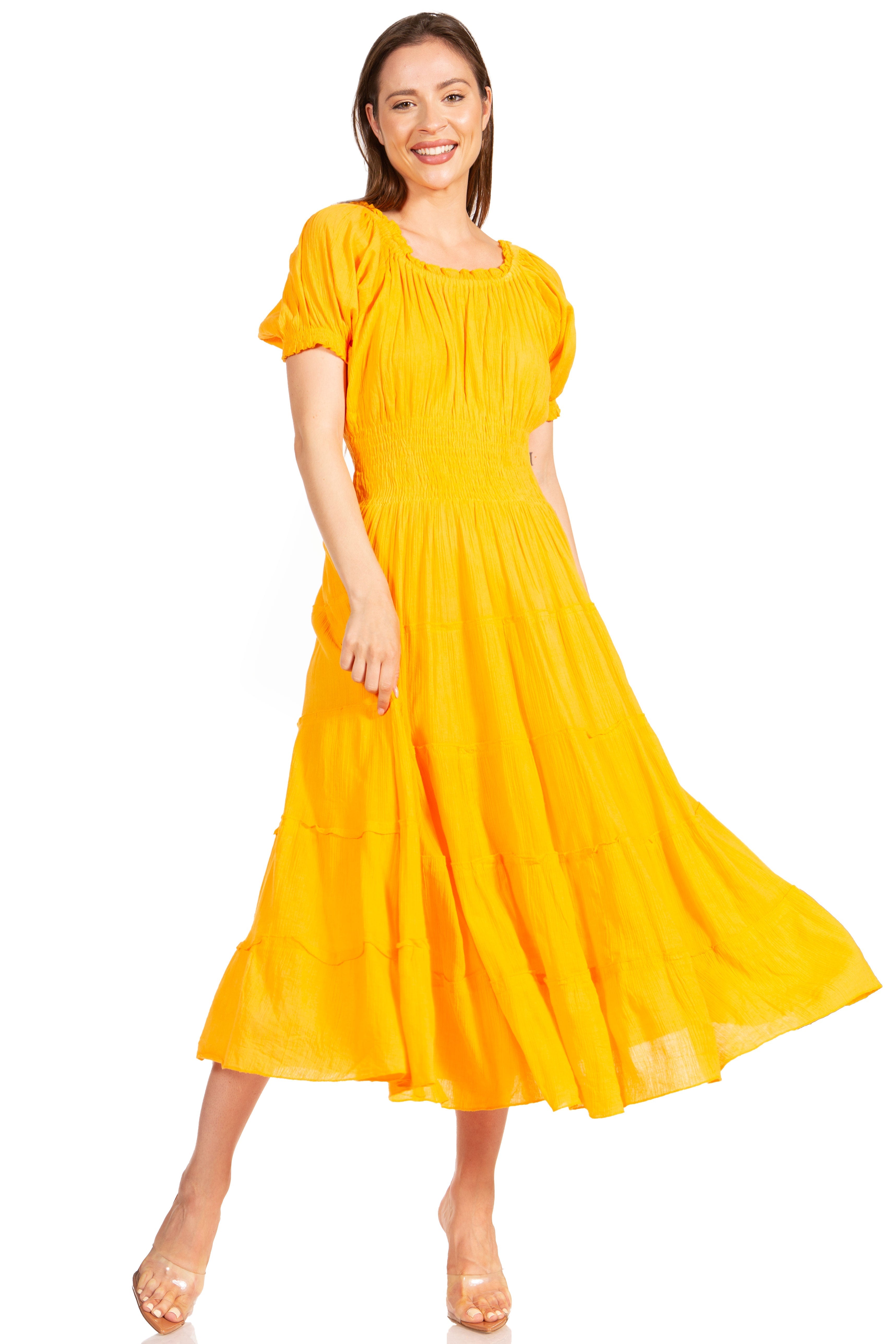 Woman wearing a yellow dress on a white background