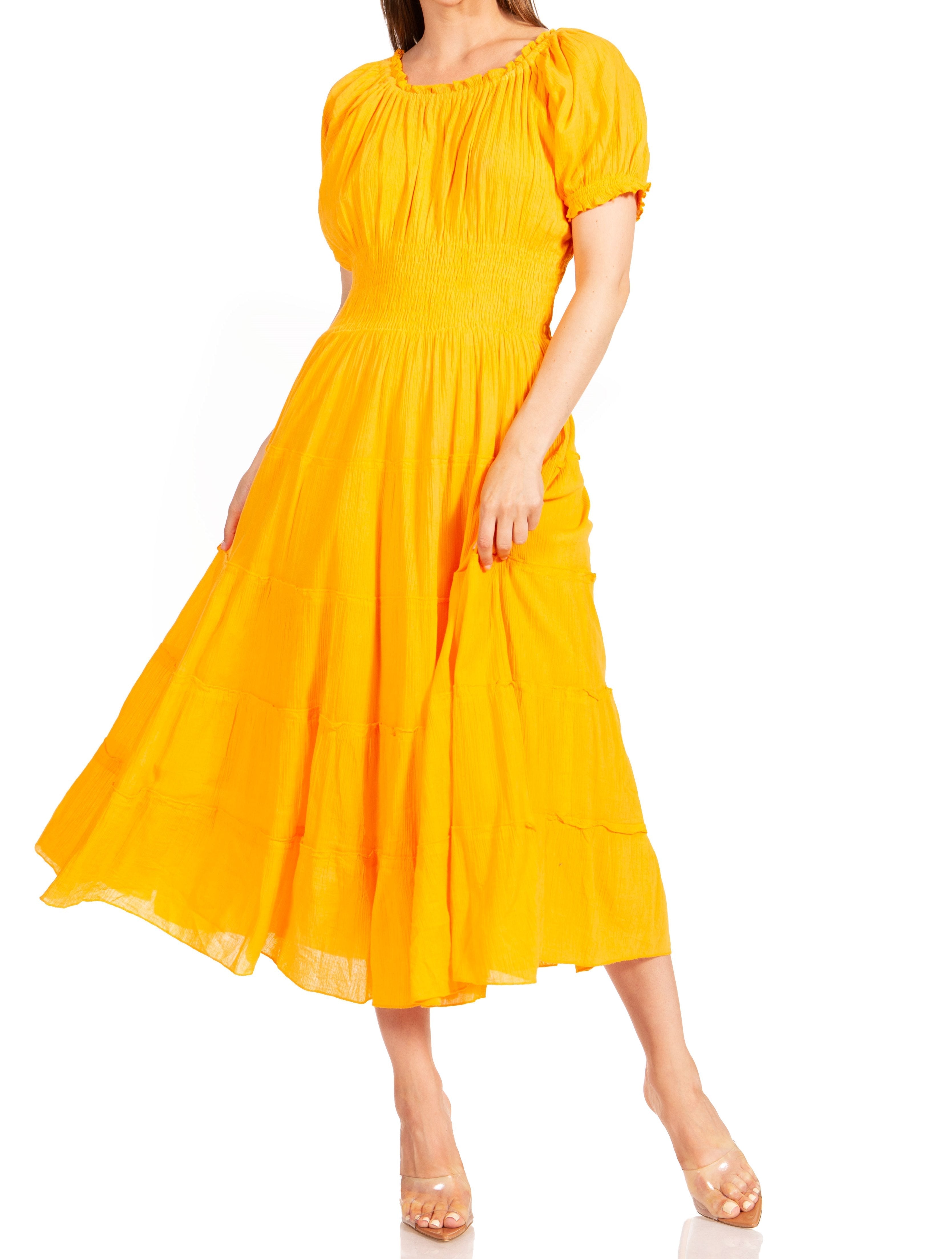 Yellow dress worn by a person on a white background