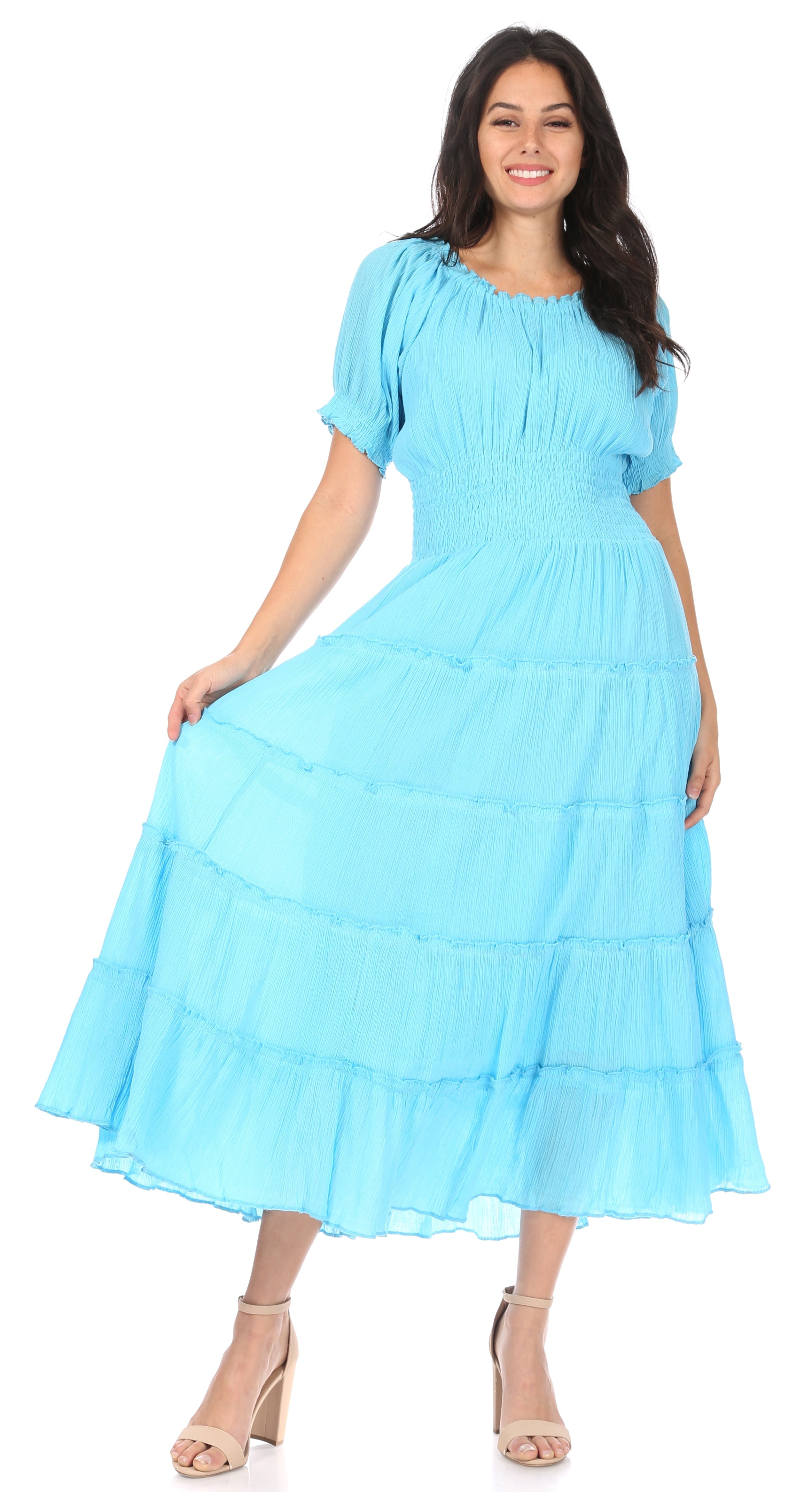 Woman wearing a light blue dress on a white background