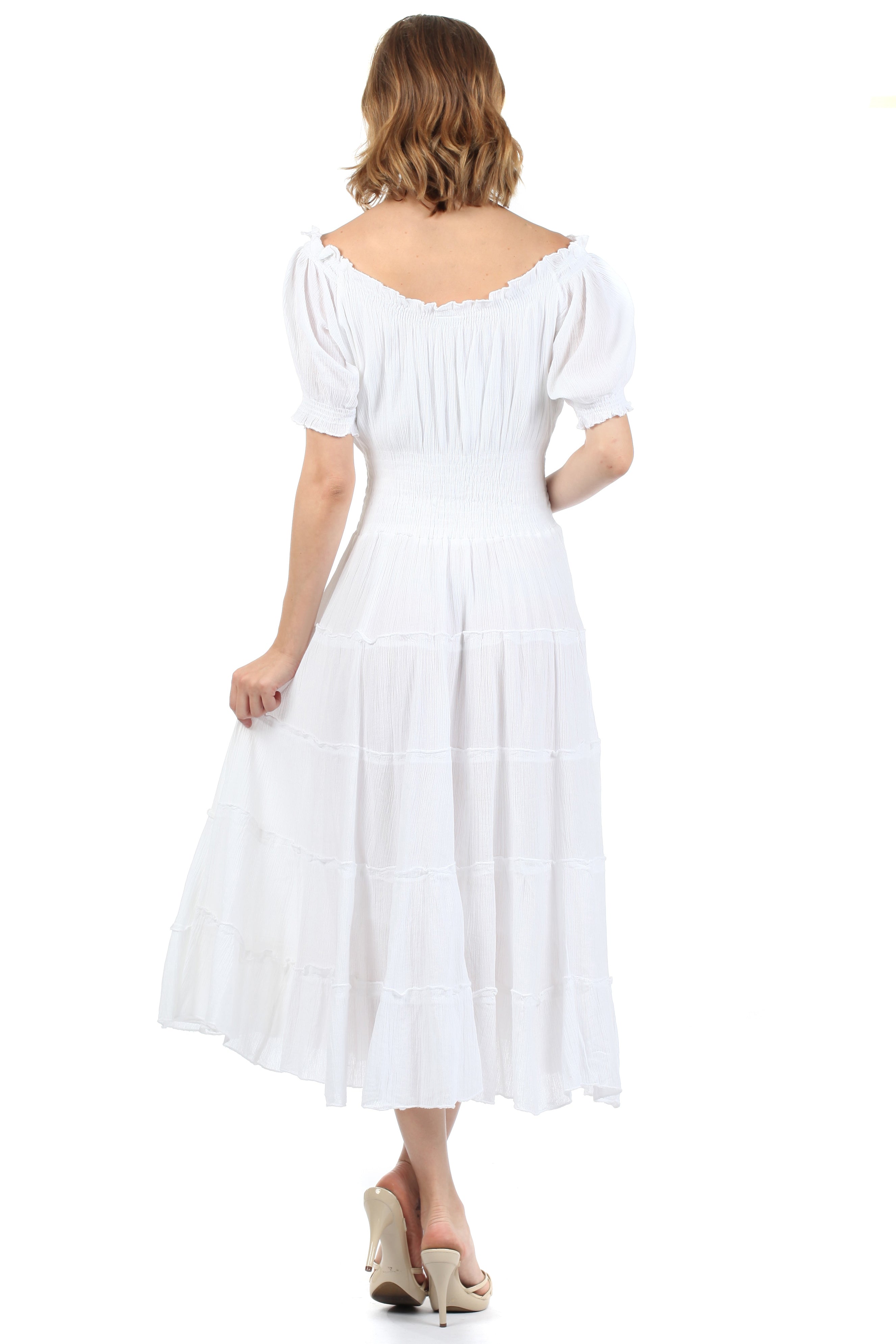 Woman wearing a white dress on a white background