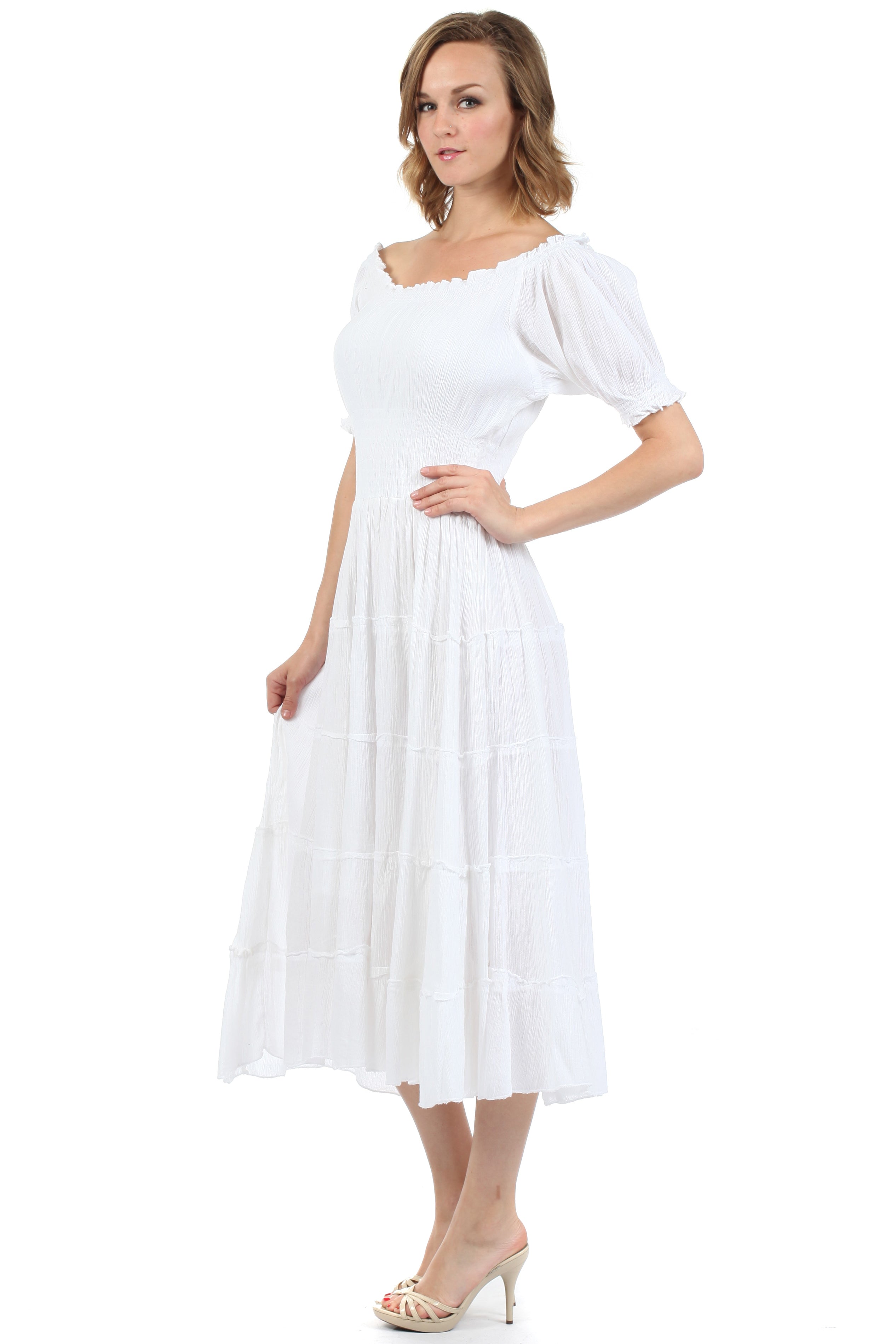 Woman wearing a white dress on a white background