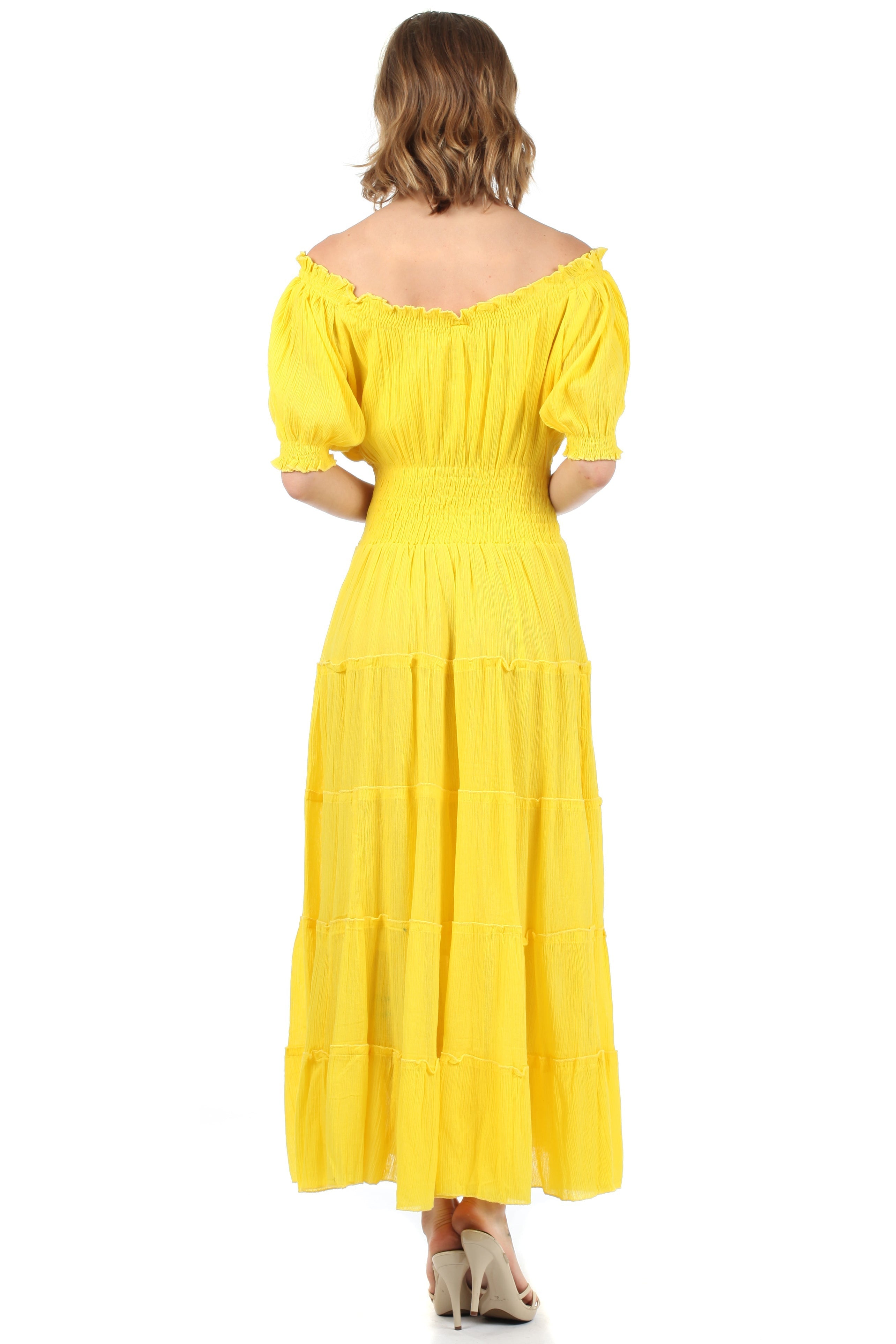 Yellow dress with puff sleeves on a white background