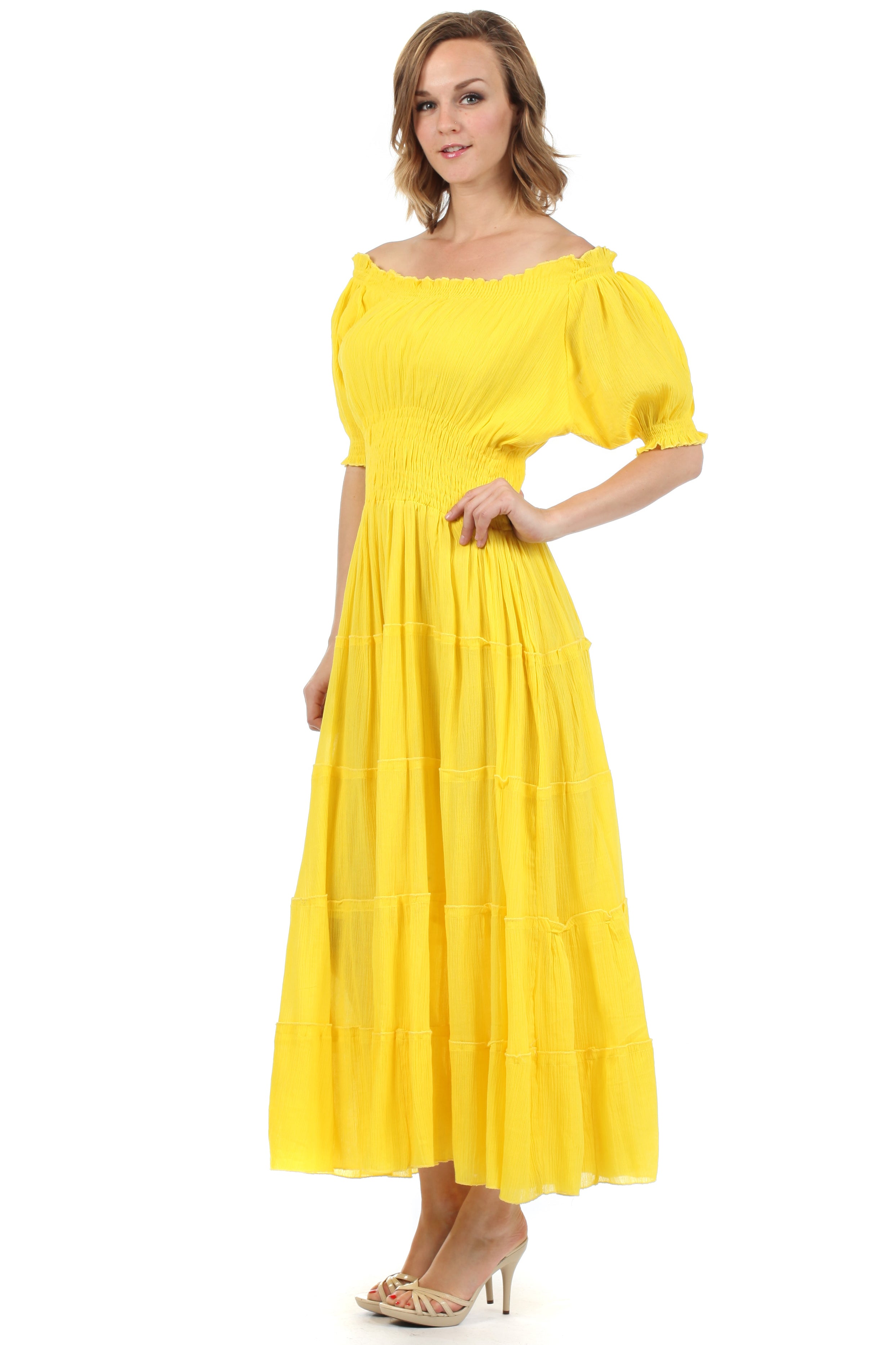 Woman wearing a yellow dress on a white background