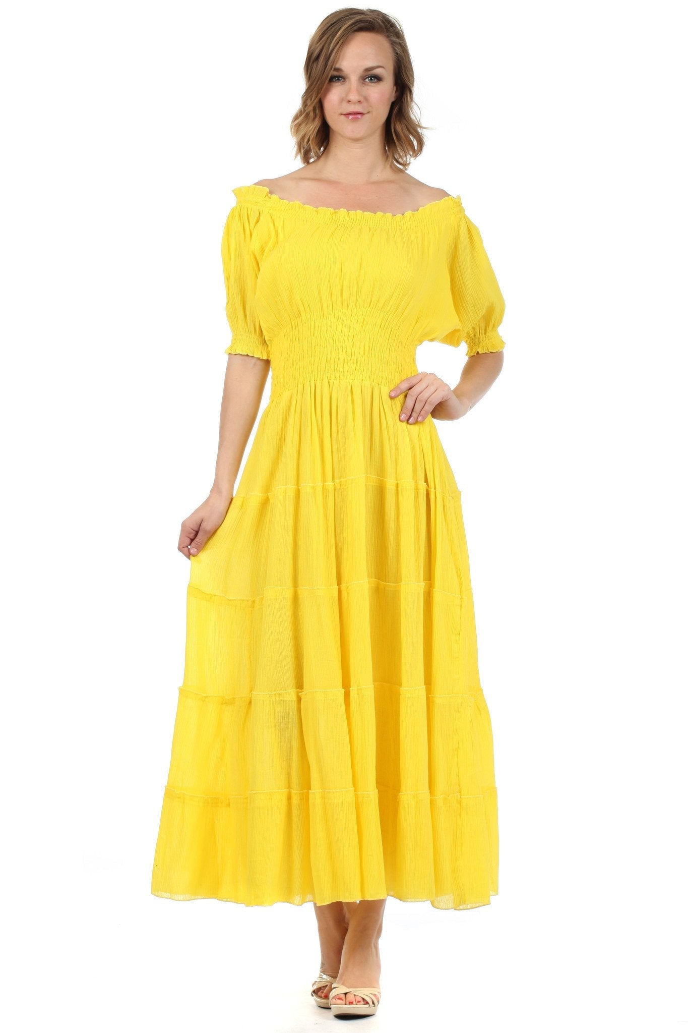 Woman wearing a yellow dress on a white background