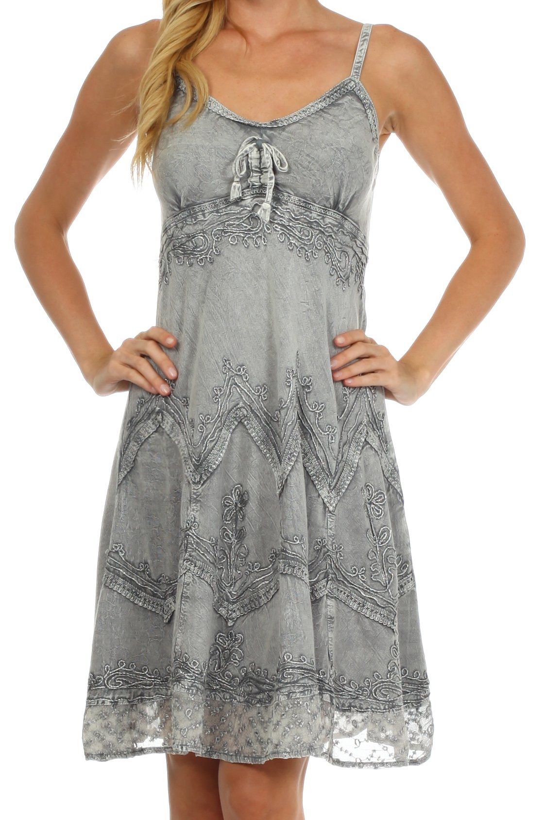 Gray patterned dress worn by a model on a white background