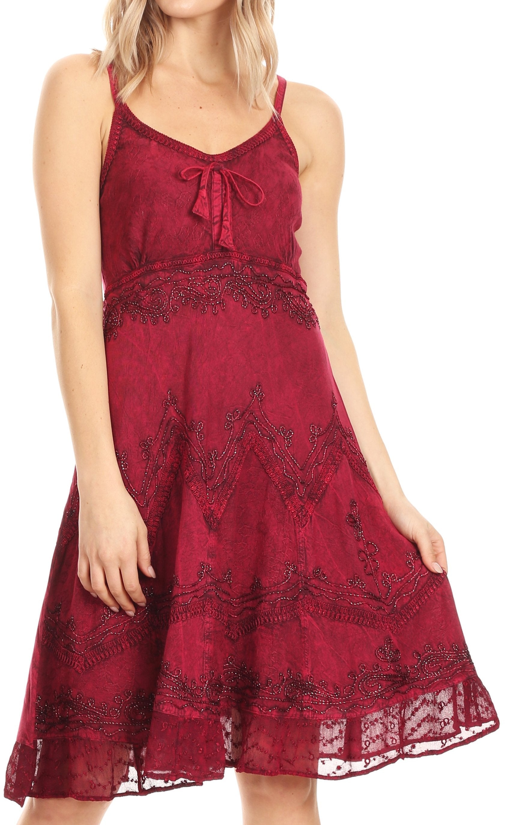 Red lace dress worn by a model on a white background