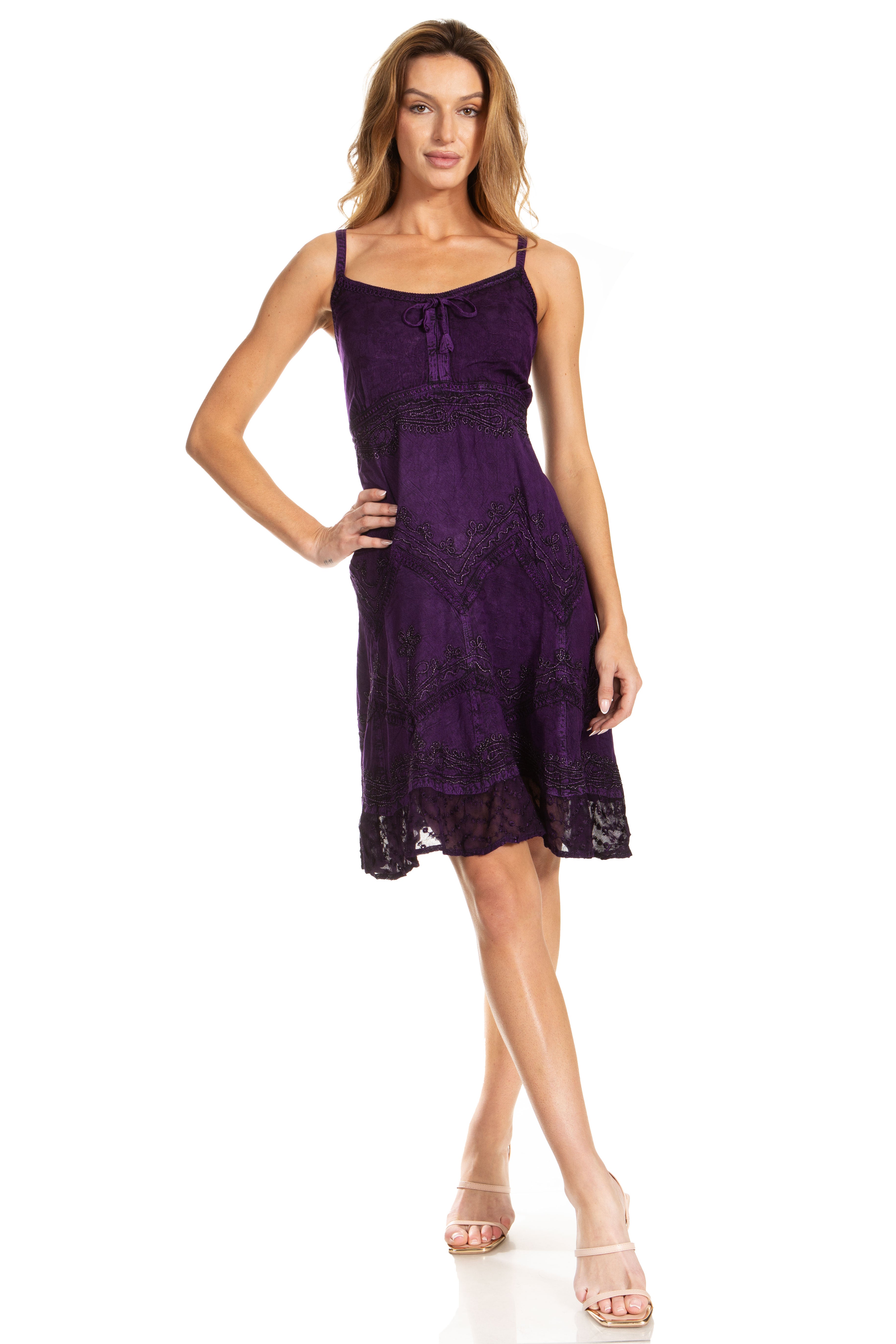 Woman wearing a purple dress on a white background