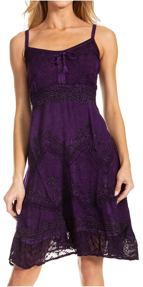 Purple lace dress worn by a model on a white background