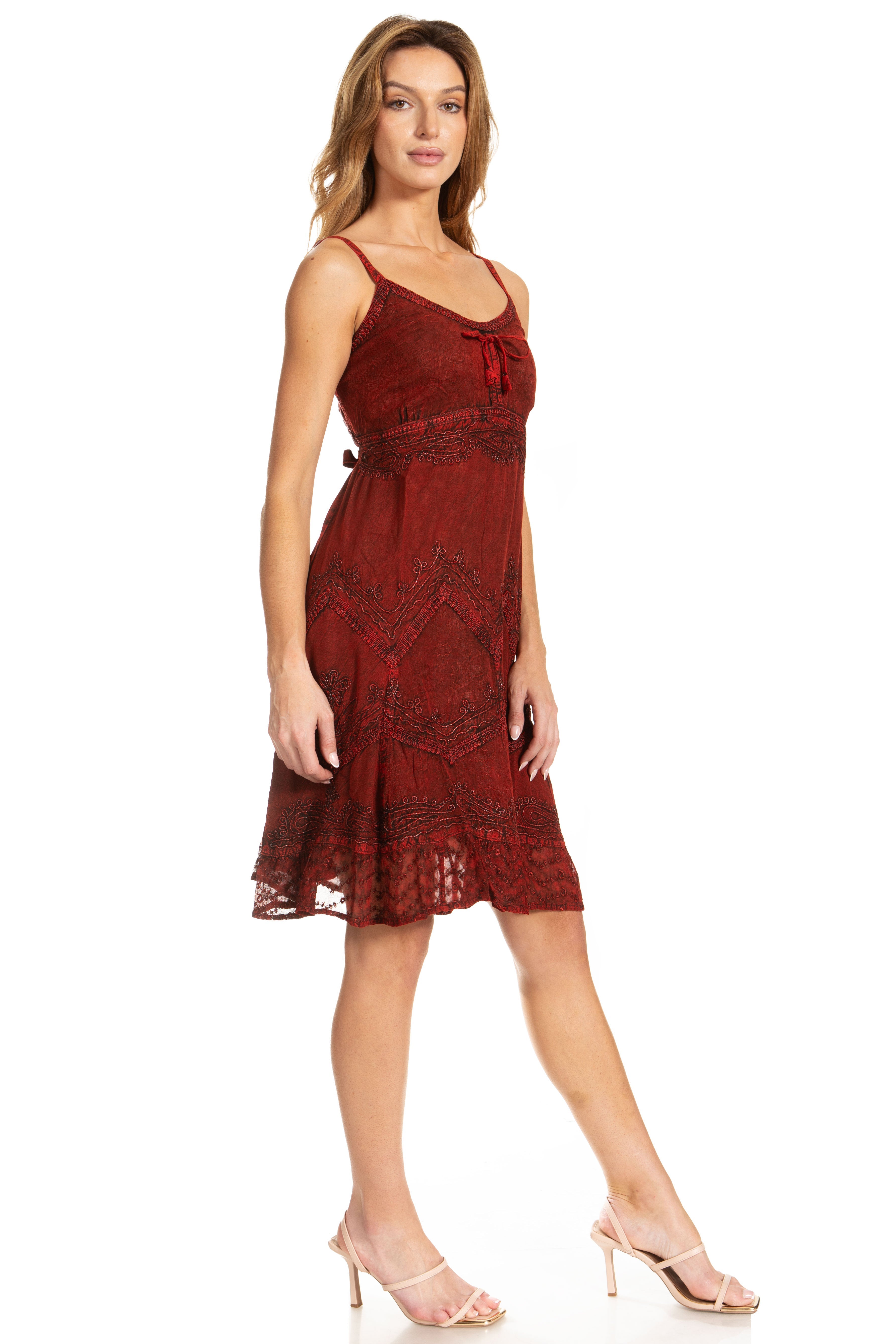 Woman wearing a red lace dress on a white background